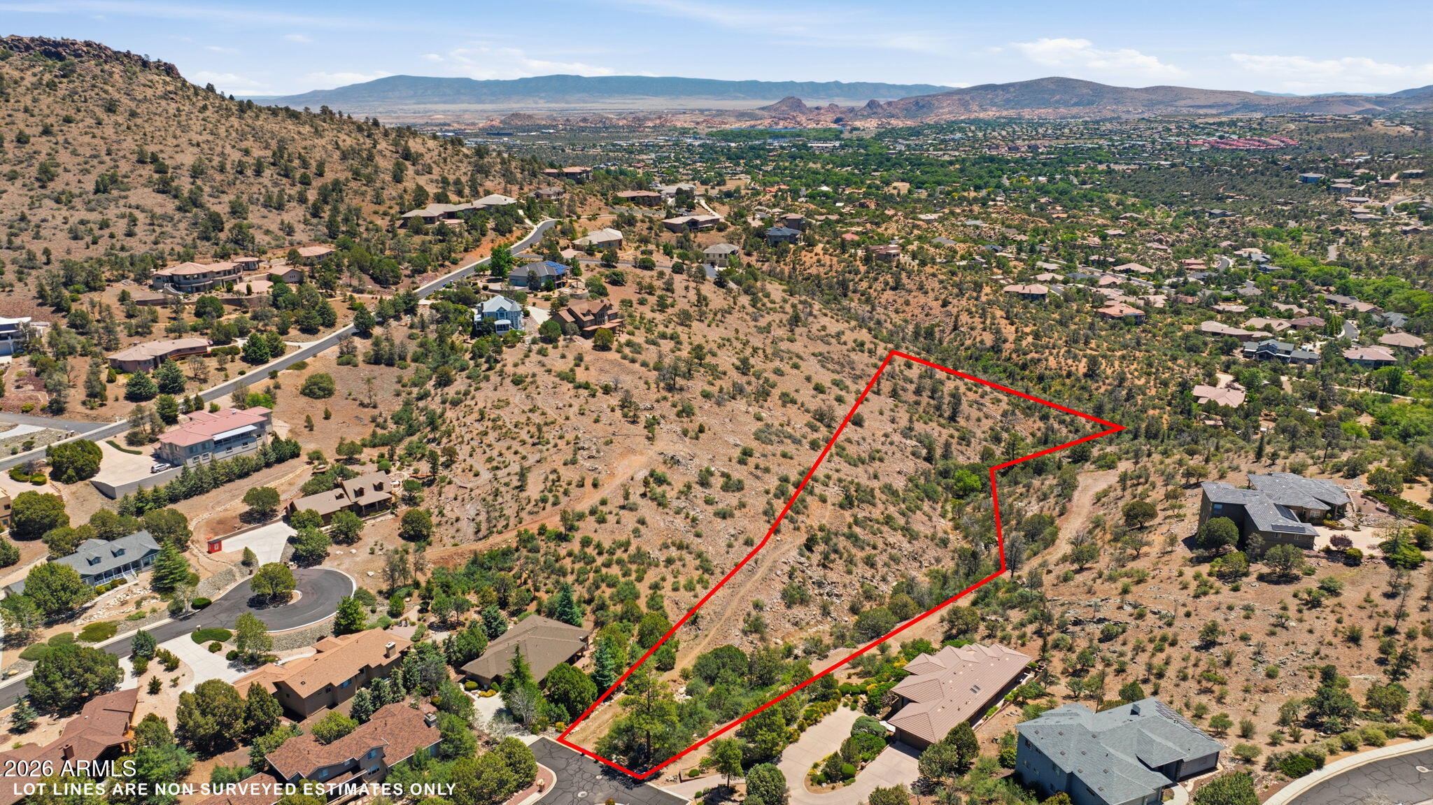 One of Southview's largest parcels is now available! This premier 2.89-acre lot offers the ultimate canvas for your custom dream home, featuring unmatched privacy, panoramic views, and a seasonal creek. Located within Prescott city limits, you get the peace of a secluded luxury neighborhood paired with the convenience of city services and underground utilities. With a gently sloped driveway for easy access, you're just minutes from historic downtown, shopping, dining, and endless National Forest trails. Don't miss this rare blend of space, scenery, and city convenience.