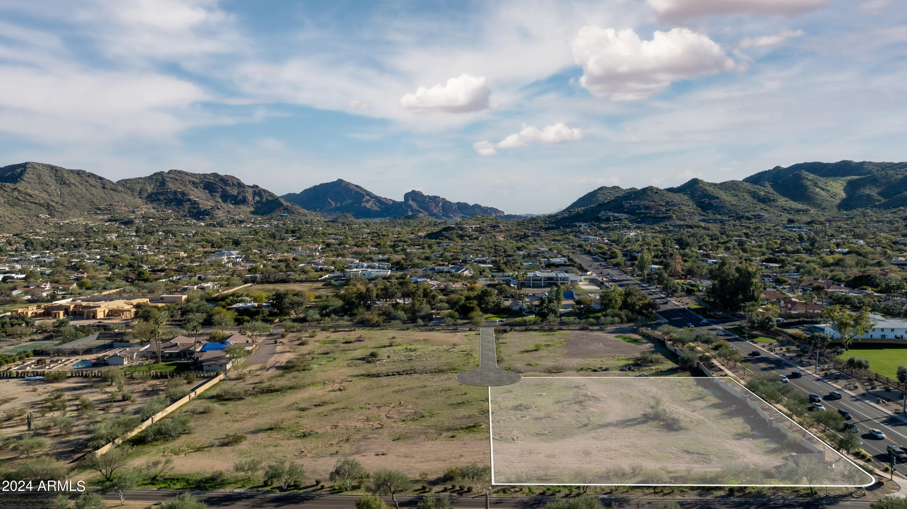 1.9 ACRE FLAT LOT - Discover beautiful modern living at Mummy View Estates in Paradise Valley, a BedBrock Luxury Community. As one of four exclusive homesites, this expansive parcel offers a blank canvas awaiting your vision for a custom residence. Whether your aspirations include sprawling yard space, a grand showcase garage for your prized automotive collection, or a family estate, this is your opportunity to design and build a custom dream home with award-winning home builder BedBrock Developers. Situated just minutes from world-class fine dining, gourmet markets, refined shopping experiences and impressive golf courses, this location perfectly blends serene panoramic views with indoor-outdoor living and convenient access to high-end comforts and amenities.
