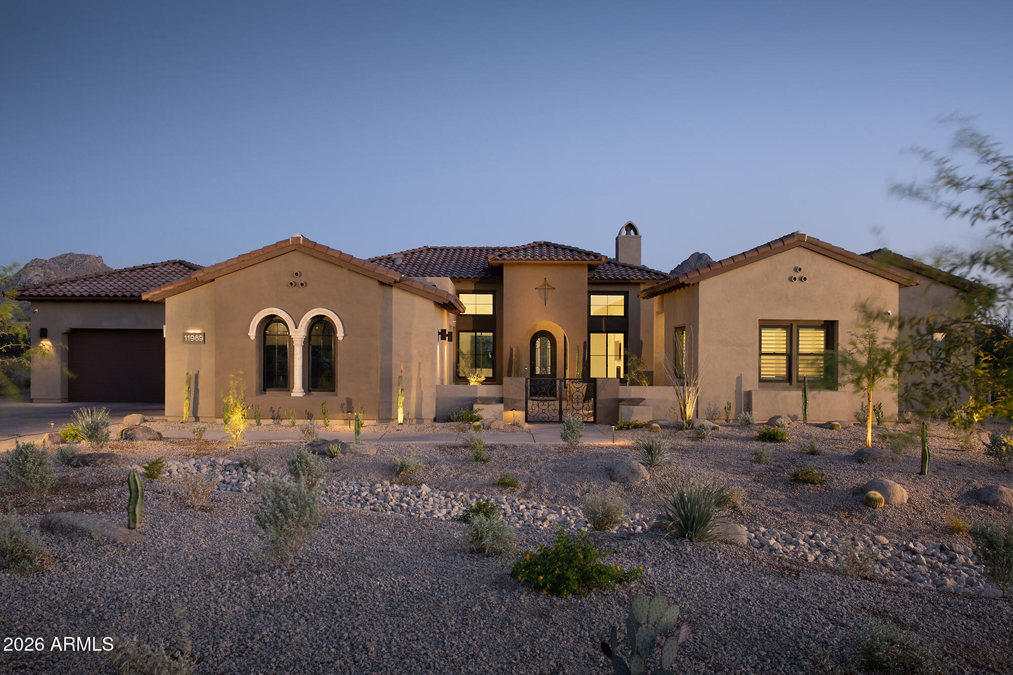 Built in 2025 by Toll Brothers, this single-level residence in the exclusive gated enclave of Ranch Gate Estates offers 4,801 square feet of refined desert living on a rare one-acre cul-de-sac homesite with commanding panoramic McDowell Mountain views and professional front landscaping currently underway. The open floor plan flows from a great room anchored by a gas fireplace, 13-foot ceilings, and walls of sliding glass that dissolve the boundary between indoors and the Sonoran desert beyond, to a chef's kitchen with a dramatic waterfall quartzite island, gas cooktop, Sub-Zero & Wolf appliances, and pantry. Eleven-foot ceilings continue through the living areas. A dedicated office and bonus room offer flexible space for work, media, or fitness. Resort inspired master bath with dual vanities, a separate shower, and a soaking tub. Two additional en suite bedrooms offer privacy and comfort for family or guests. A separate 625 square foot two-room casita completes the layout, ideal for multigenerational living or a private guest retreat. An oversized four-car garage, three covered patios designed for seamless indoor-outdoor desert living, and a favorable north/south exposure that maximizes comfort year-round complete the package.

The one-acre lot is a rare blank canvas in 85255. No inherited design decisions. Build your pool, outdoor kitchen, and entertaining space exactly as you envision it, in one of the most coveted zip codes in the country. Steps from the McDowell Sonoran Preserve and 75 miles of world-class trails, minutes from premier golf, dining, and shopping. Toll Brothers quality. Four-car garage. One acre. Unobstructed mountain views. Your backyard. Your vision. Price includes a $100k pool allowance.