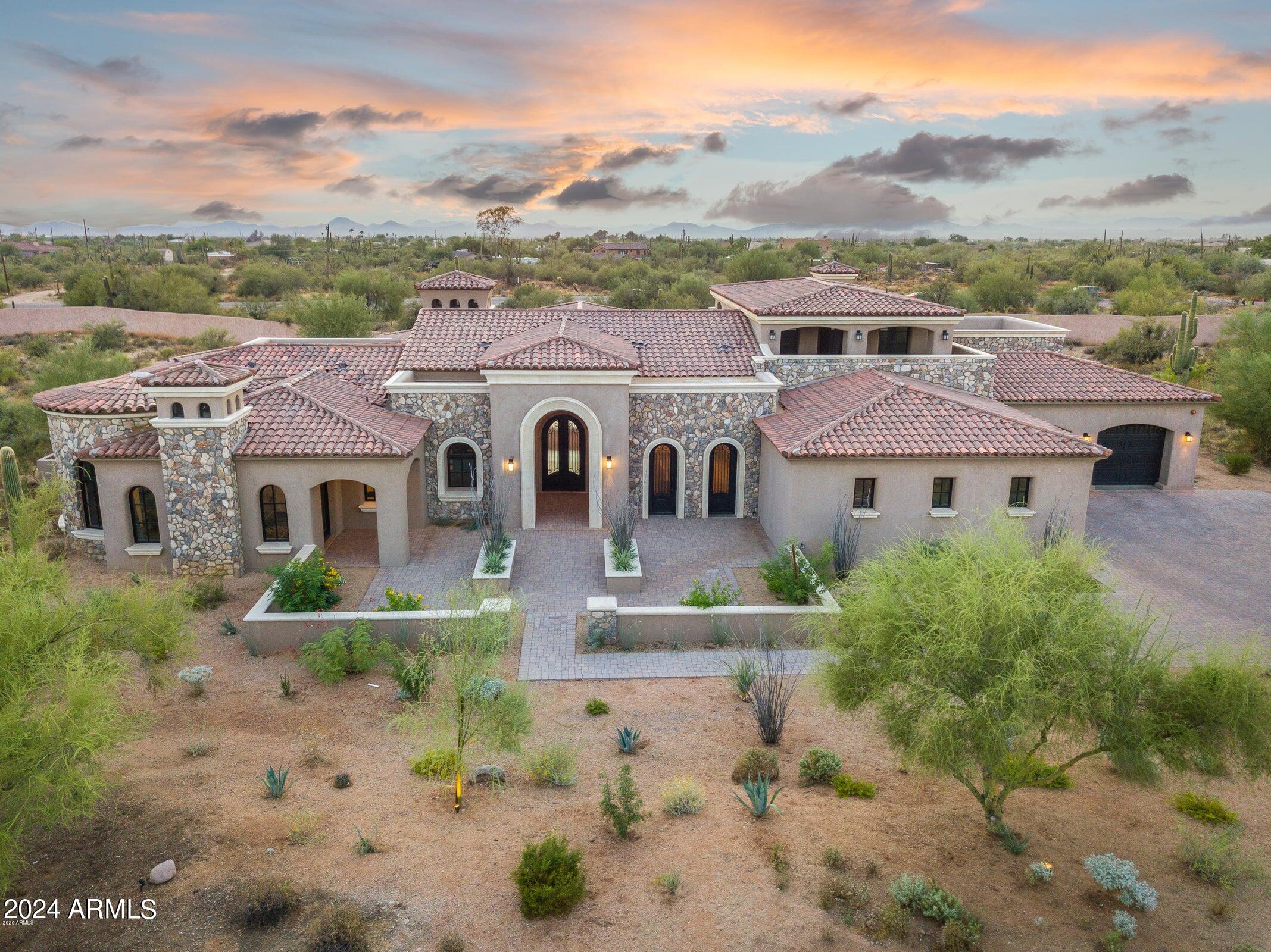 Seller finance great TERMS
Located in the guard-gated community of Whisper Rock, this stunning residence is thoughtful. An open concept plan, this home features the latest finishes, all on one level. Fabulous entertainer's kitchen with furniture-grade cabinetry, pantry with wine refrigerator. 4 guest bedrooms in the main house, each with an ensuite and walk-in closets. Master suite has his & her walk-in closets and luxurious bath. Custom office with floor to ceiling woodwork. Prewired for 4 fully automated lighting and AV control. Smart pool with unique lighting features. Retracting glass doors bring the outdoors in, showcasing the grand pool area & surrounding scenic desert views