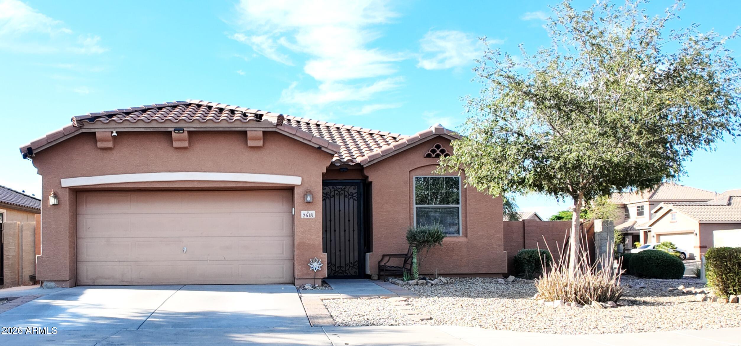 Welcome to 2618 W Gary Way! This beautifully maintained single-story home offers 3 bedrooms, 2 bathrooms, and approximately 1,344 square feet of comfortable living space. Situated on a desirable corner lot, this ranch-style home features an open-concept great room that flows seamlessly into the well-appointed kitchen with a breakfast nook, pantry, and ample cabinet space. The split floor plan provides added privacy, with a spacious primary suite featuring a walk-in closet and an en-suite bath with dual vanities. Tile and carpet flooring, Step outside to a generously sized backyard with plenty of room to design your dream outdoor retreat, pool, or entertainment space. Conveniently located near schools, parks, shopping, dining, and freeway access.