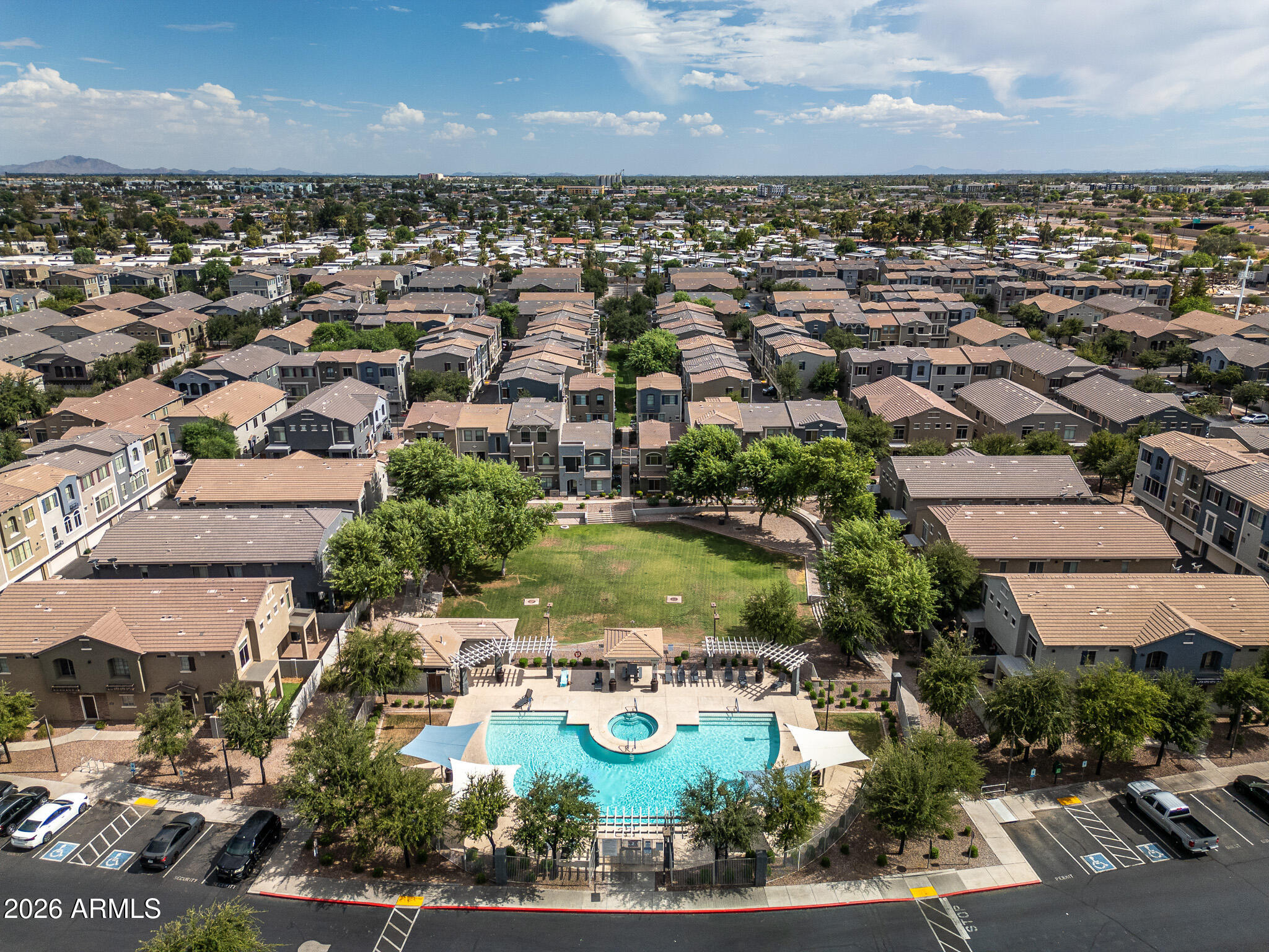 Fresh, bright, and dialed in for low-maintenance Tempe living. This 2-bed, 2.5-bath townhome offers 1,105 sq ft with updated wood-look flooring, new interior paint, painted kitchen cabinets, stainless appliances, quartz bathroom counters, and a clean open layout that feels easy from day one. The kitchen flows into the main living area, while arched windows bring in natural light and character. In-unit laundry and a 2-car garage add the everyday function buyers want. 2 Community pools & hot tub. Ideal for a first-time buyer, ASU student, or lock-and-leave lifestyle in the Villagio gated community near ASU, Cubs stadium, Tempe Town Lake, Sun Devil Stadium, Tempe Marketplace, light rail, Sky Harbor, and quick Loop 101/202 access.