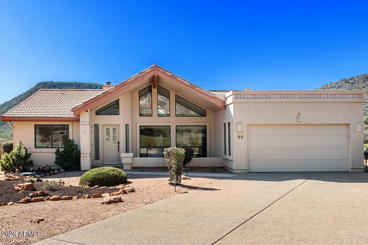 A NO HOA property in Sedona! Close to one of the most beautiful golf courses in the state, Sedona Golf Resort! A long driveway leads you to this elegantly built, single level home. Enjoy views of Castle Rock from the living room, or bask in the beauty of House Mountain from the  backyard patio. With a built in outdoor grill, it's an ideal house to host evening dinners. The kitchen's equipped with upgraded appliances and large granite countertops. While the bedrooms have been remodeled with sleek, 6 foot tile flooring. Large windows fill every room with natural light, yet the home's Northern orientation ensures there's never too much direct sunlight. To have a beautiful no HOA home in the Village of Oak Creek is rare. Whether you are looking for a primary residence or an investment, this one checks all the boxes. By appointment only. No walk ups please.