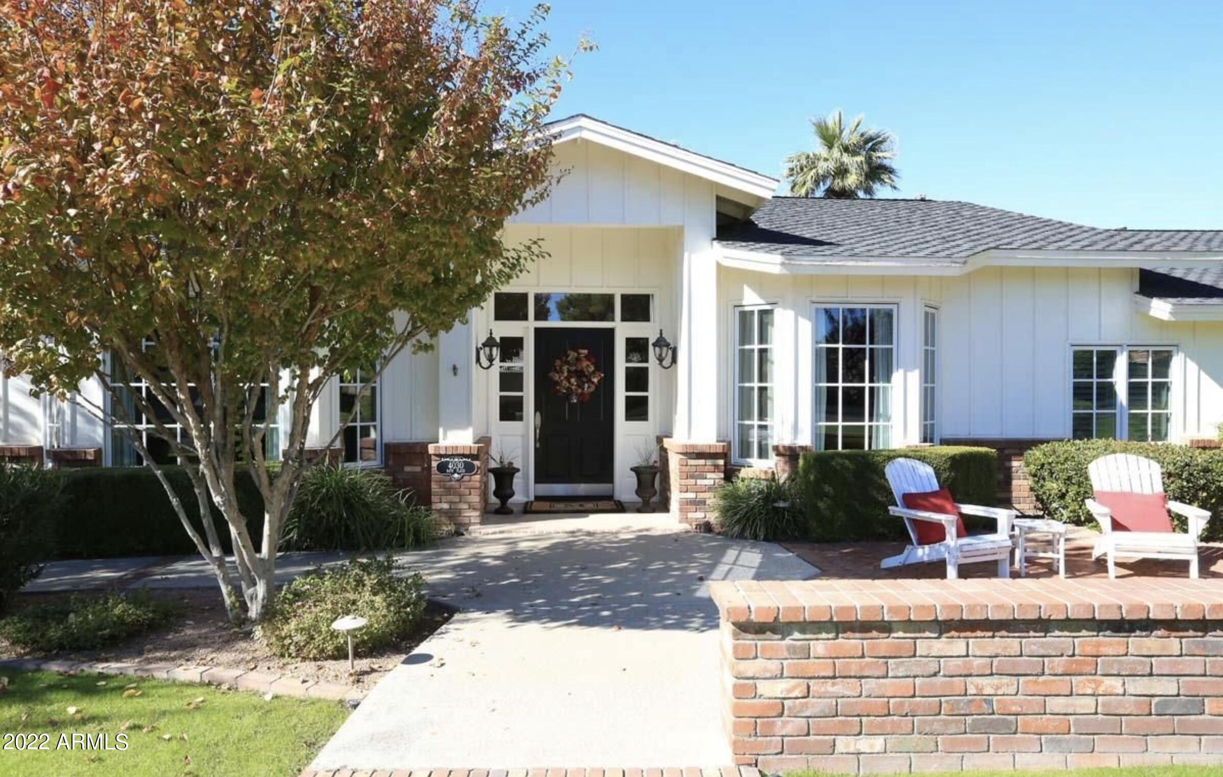 This home has pure Arcadia Charm and Character.  5 Star curb appeal with sprawling lush green grass, quaint courtyard and mature trees on one of Arcadias most picture perfect streets.  Timeless Split-Floorplan Ranch w 5 Beds/ 4.5 baths, Plus separate office, spacious den and bonus game room.  Main house and Casita over 4800 sq/ft on spacious 2/3 acre lot.  Gourmet kitchen boasts high-end appliances including brand new Wolf stove.  High ceilings. Two charming fireplaces. Sparkling pebbletec pool and brand new Jacuzzi.  Majestic Camelback views.  Spacious 3 car garage.   Located in the heart of Arcadia & close to all that Oldtowne Scottsdale & Camelback corridor has to offer.  Greatly desired school district.