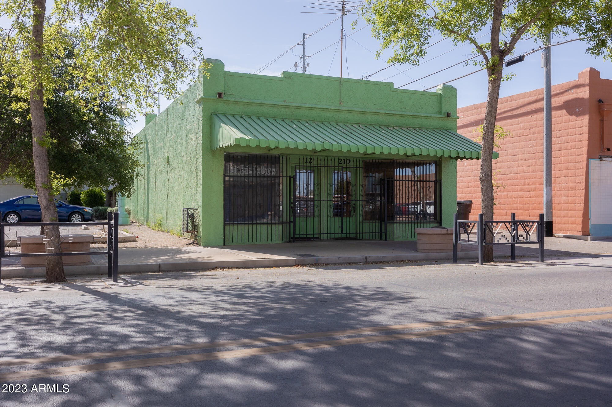 Two suite property with separate electric meters. Former barber shop & salon/tattoo salon. Multiple electric and water outlets. Highly recognized downtown property located adjoining City owned paved parking lot. Address includes 210 & 212 N Florence St.
