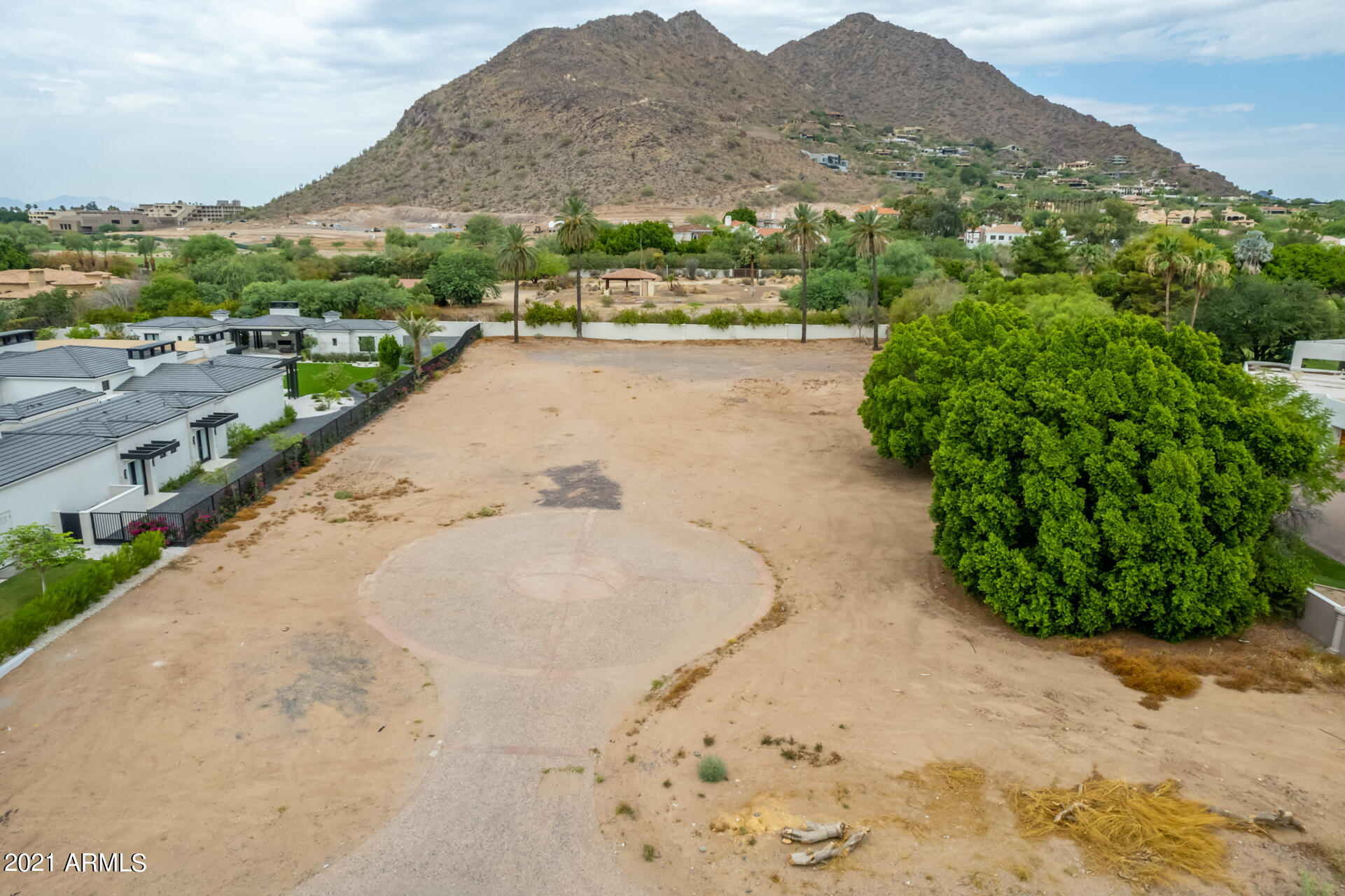 A+ location. Easily the best lot left available in Paradise Valley. Nestled between 12-15 million dollar builds lies this soaring view lot scraped and ready to build. Lot is just north of Arcadia and nestled in Billionaire's row. West facing Camelback views with huge shade in the afternoon. Bike ride from shops, restaurants and AJ's, between the Phoenician and the new Ritz! Beyond exclusive and very private street. High end Arcadia/ PV builder Brimley has plans that can be altered and approved as you like if builder package also desired.