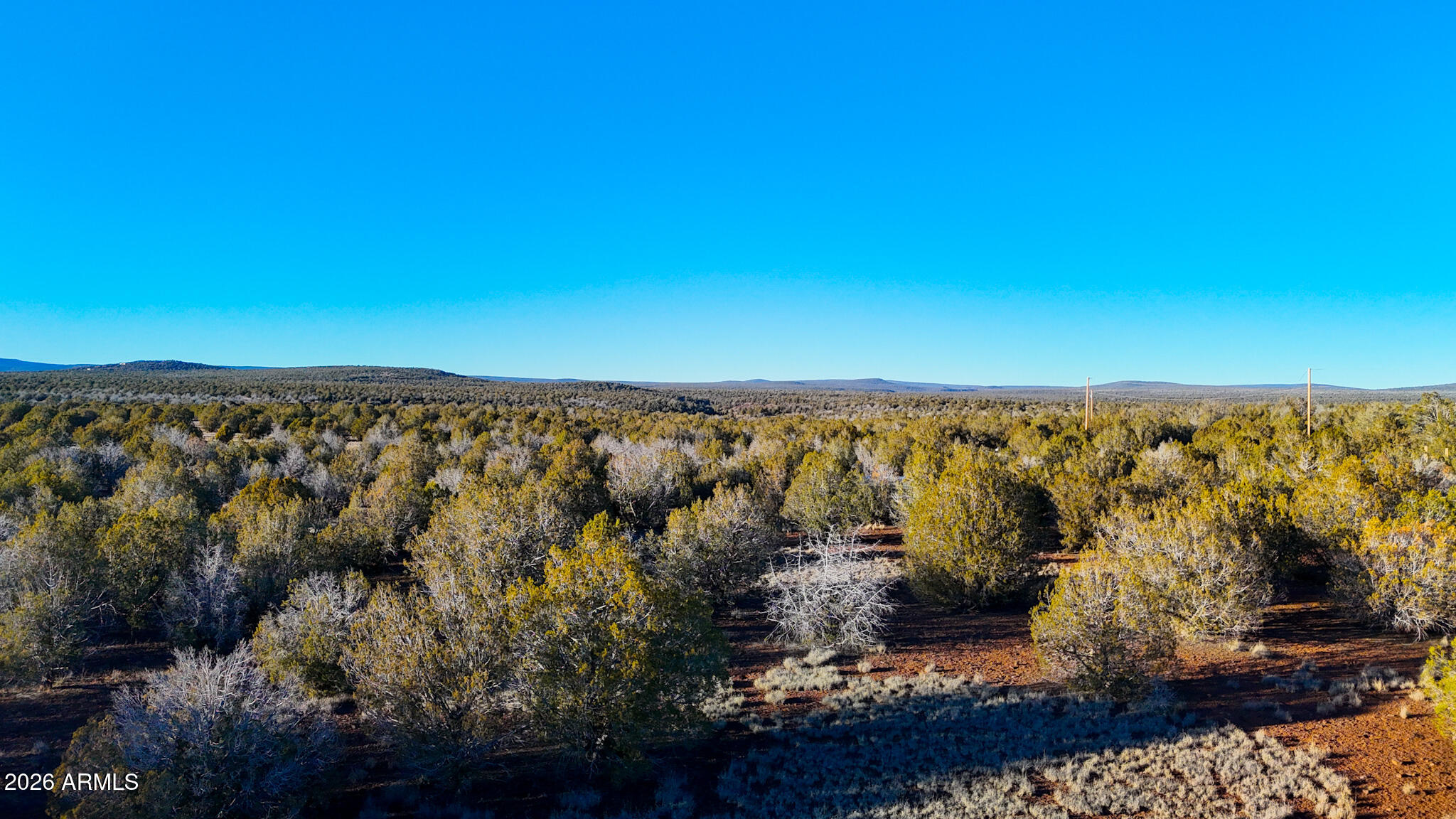 Great opportunity to own affordable land near Ash Fork, AZ. Located on W Skyline Dr, this parcel offers wide open space, big sky views, and peaceful rural surroundings. Easy access to I-40 and Route 66, with nearby access to Ash Fork, Williams, and Flagstaff. Ideal for long-term investment, recreation, or a future homesite. Buyer to verify zoning, utilities, access, and intended use. OWNER WILL CARRY.