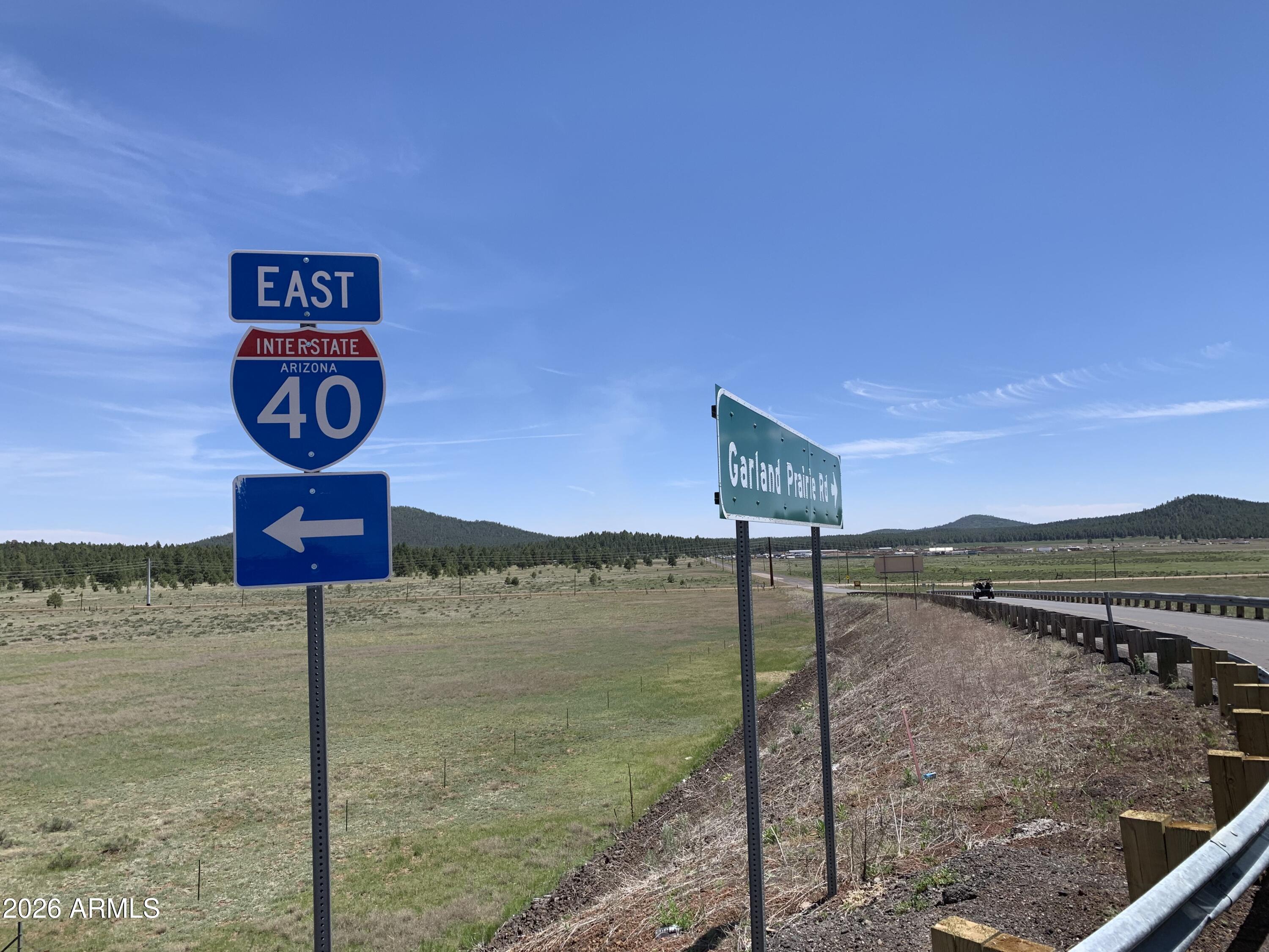 PREMIUM AND UNIQUE FLAT HIGH VISIBILITY 10 ACRES ALONG I-40 IN THE CITY OF WILLIAMS. NO WATER, BUT GREAT LOCATION FOR MINI STORAGE OR BRING YOUR PROJECT ! THE EXISTING HOUSE IS NOT PART OF THE 10 ACRES BUT COULD BE SOLD SEPARATELY (RENTED TO A TENANT, PLS DO NOT DISTURB)