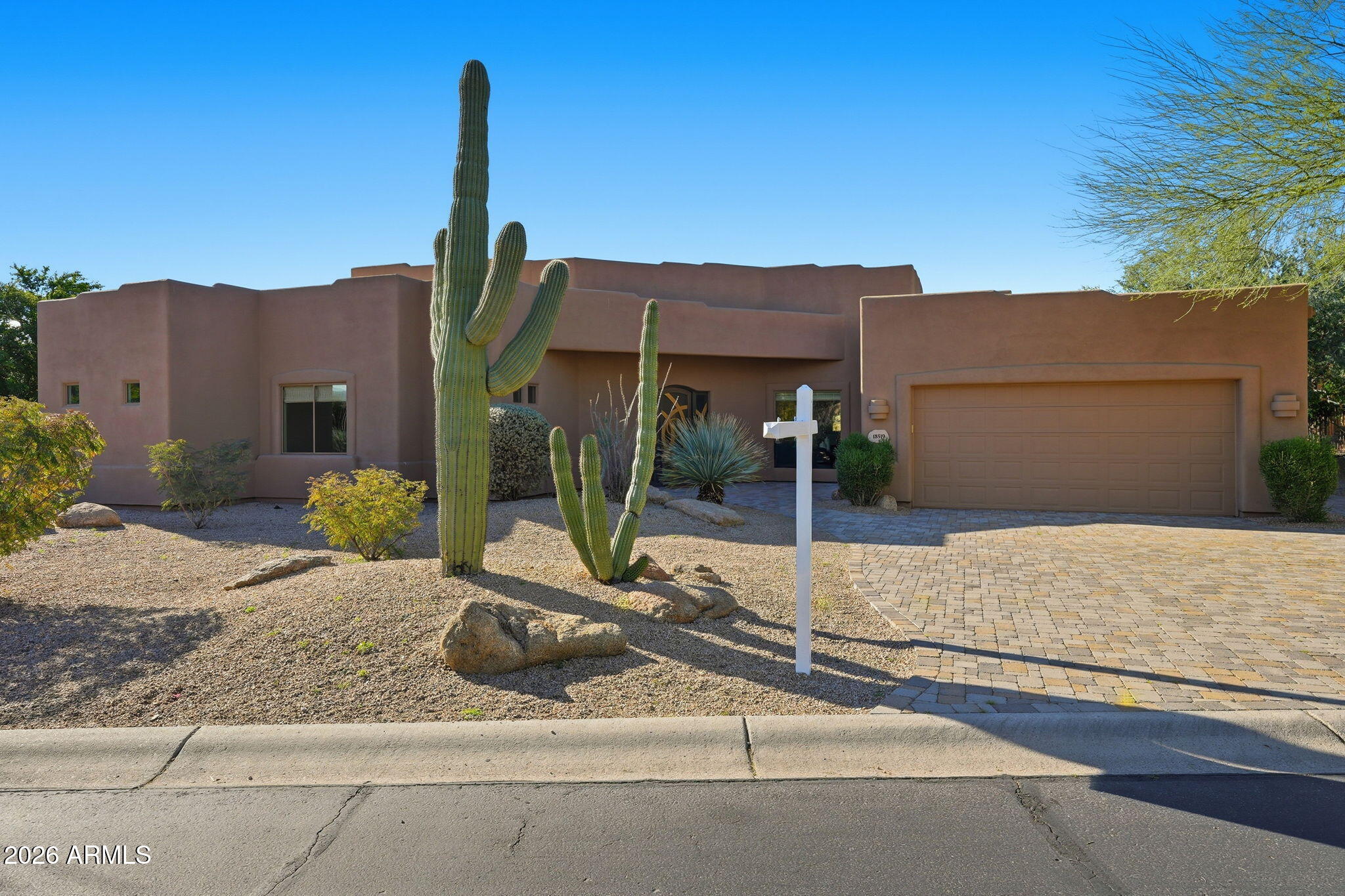 Welcome to your dream home in the premier golf community of Tonto Verde! This stunning property at offers luxurious living with breathtaking views and an exceptional design. Step inside to discover the brand new freshly laid wood floors , soaring ceilings that add to the home's spaciousness, and custom cabinets crafted to perfection. The open floor plan seamlessly flows through the front entrance to the dinning and living room. Perfectly situated between the kitchen and living room you have your own wet bar with built in beverage fridge and wine rack. The kitchen itself is a chef's dream with stainless steel appliances, a spacious center island, and a beautifully crafted custom-tiled backsplash complemented by gorgeous granite countertops. The large master suite is a true retreat featuring a dual sink vanity, a walk-in closet, a private toilet room, and a large walk-in shower with dual shower heads for a spa-like experience. The second bedroom is ensuite and ideal for guests or family, while the versatile third bedroom can also be used as an office or guest room, complete with its own walk-in closet. The home boasts a 2.5-car garage, with a separate golf cart garage door for convenience and storage. Freshly painted on the exterior, this home features mature, low-maintenance landscaping that blends beautifully with the surrounding desert environment. Enjoy panoramic views of the 17th fairway from your private roof-top deck, a perfect spot for relaxing or entertaining. The large patio area allows for plenty of outdoor living space to enjoy Arizona's stunning weather year-round. As part of the Tonto Verde community, you'll have access to a range of top-notch amenities, including a pool, a fitness room, a clubhouse, and an award-winning restaurant. This is truly resort-style living at its finest! Don't miss out on this exceptional home! Come and experience the luxury and comfort this property has to offer.