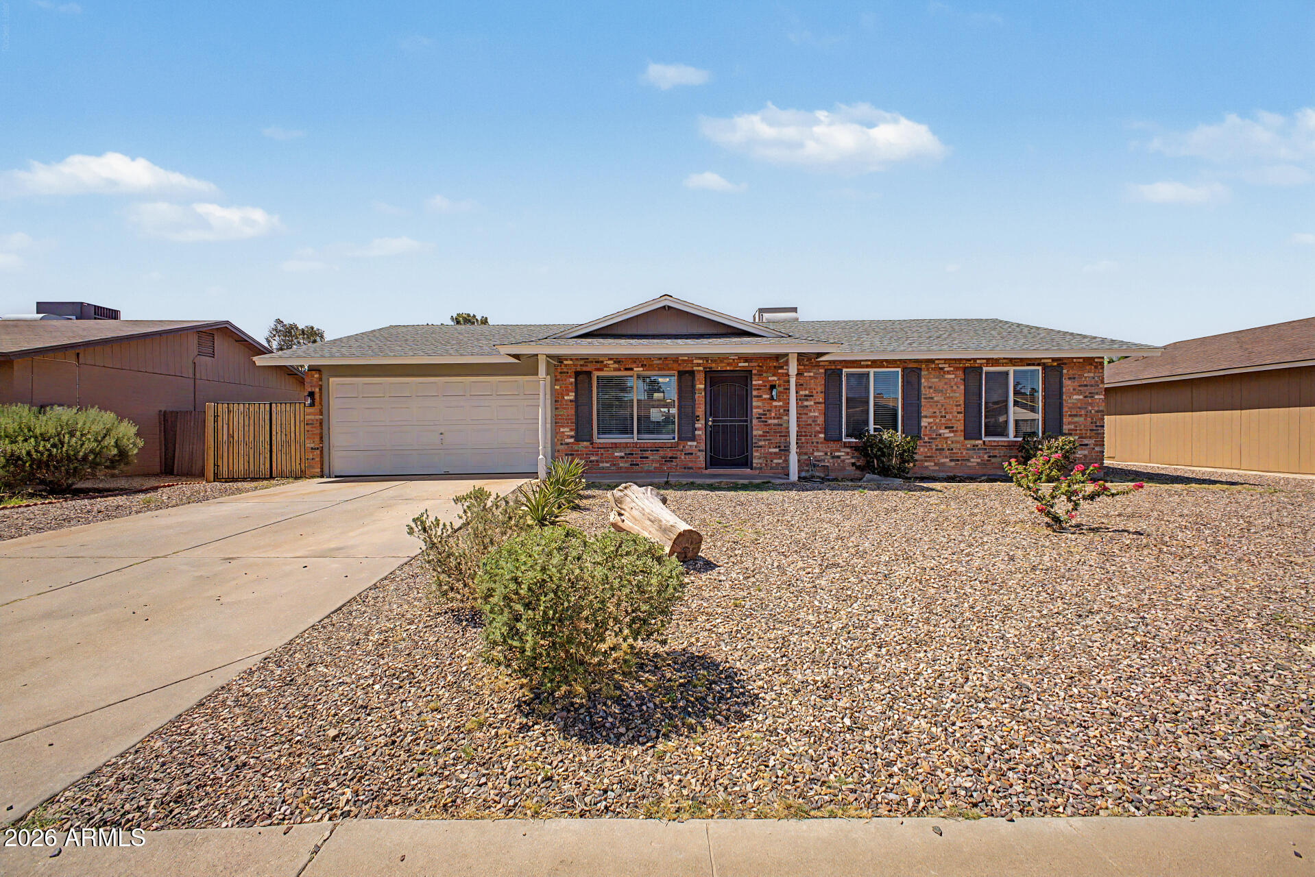 Recently remodeled and move-in ready, this beautifully updated home combines modern style with everyday comfort and may be sold furnished! Charming curb appeal features brick accents, a covered front porch, low-maintenance landscaping, RV gate access, and a 2-car garage. The open floor plan offers fresh interior paint, recessed lighting, ceiling fans throughout, luxury vinyl plank flooring, and carpet in the bedrooms. The upgraded kitchen showcases white shaker cabinets, quartz countertops, and a pantry. The spacious primary suite includes a walk in closet and remodeled ensuite with dual sinks and a tiled shower. A versatile den adds extra living space, while the oversized backyard with a covered patio offers endless potential. Conveniently located near Loop 202!