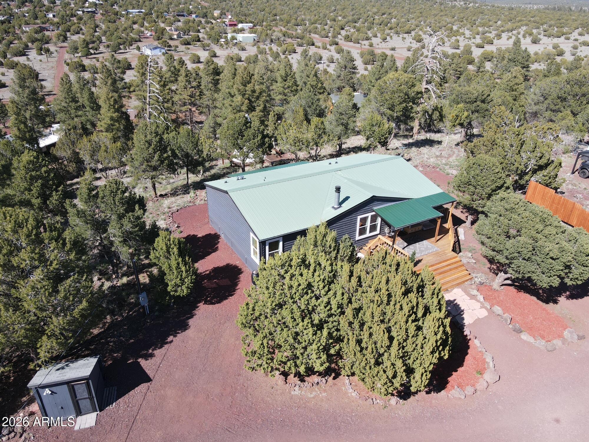 ENDLESS VIEWS. ZERO CROWDS. PURE FREEDOM. At the quiet of Brook Hill Road, this newly updated 3-bed, 2-bath, 1528- sq ft home on 1,03 acres puts Forest Service land right out your front door - no driving, no trailhead parking, just go. Watch summer monsoons roll across vast, open rolling hills from your front porch at 6,700 ft. Ponderosa pines out back, metal roof, no HOA, and part-time neighbors mean peace and quiet is real. Hike, bike, hunt, ride OHV, or walk your dog on a whim. 35 min to Flagstaff, 6 min to Williams. I hour to the Grand Canyon.
ADDITIONAL INFORMATION AT THE END OF THE PHOTOS