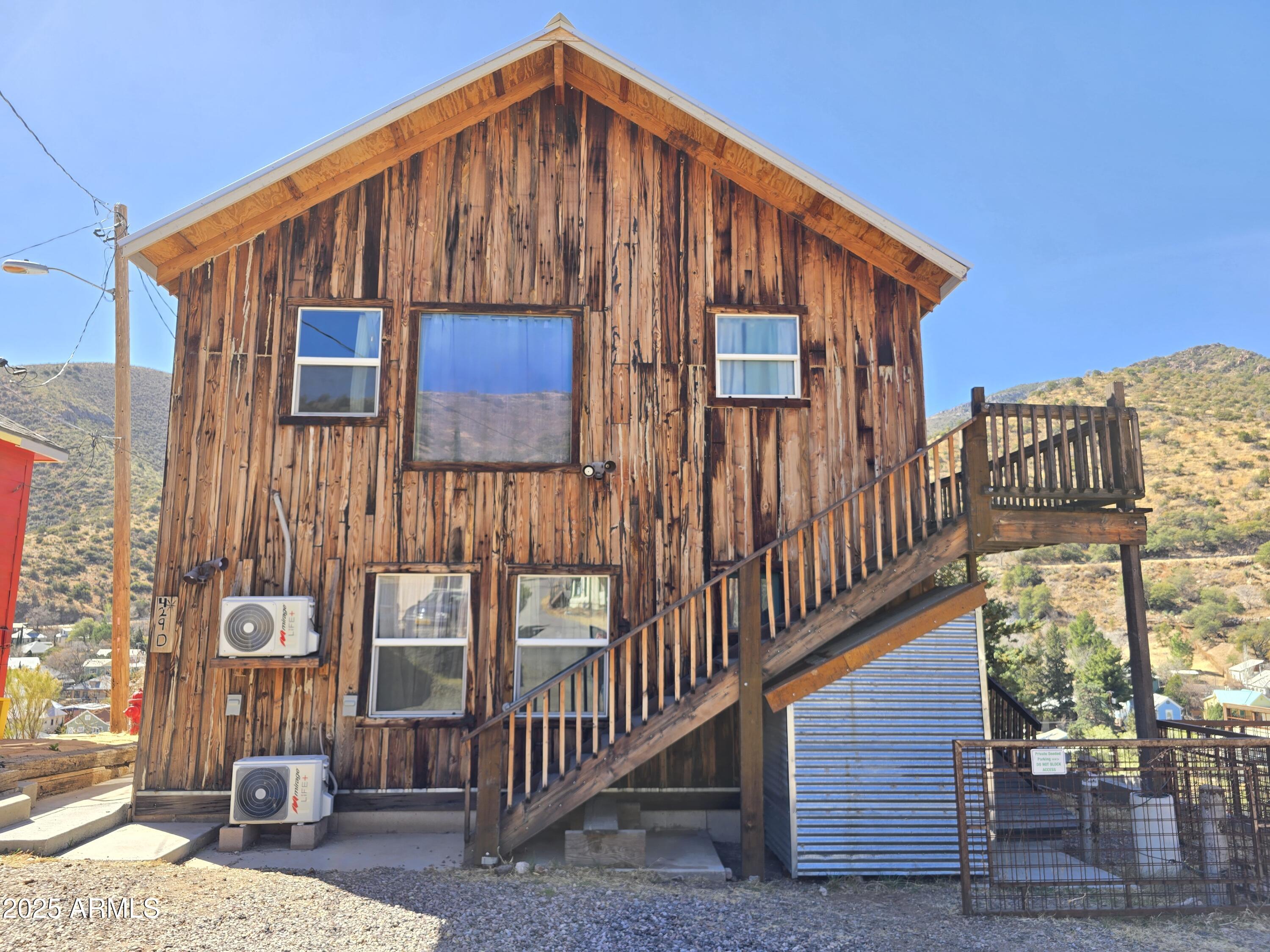 Old Bisbee Rare opportunity to acquire a fully furnished, income-producing 4-unit property in the heart of Historic Old Bisbee. Built in 2018, this modern multi-unit residence offers newer construction, flexible unit configuration & strong rental potential. Fully Furnished 4-Unit Property

Exceptional opportunity to acquire a fully furnished, income-producing 4-unit property in the heart of Historic Old Bisbee. Built in 2018, this modern multi-unit residence offers the advantages of newer construction combined with flexible rental configurations and strong income potential.

The property features four units across two levels:

" Two 1-bedroom / 1-bath units, each with a full kitchen and dedicated laundry space
" Two studio units, each with a full bathroom

Currently operating as a successful short-term rental, the property conveys fully furnished -- including appliances, beds, and televisions -- providing a true turnkey investment for the next owner.

Units may be rented individually or configured for short-term, mid-term, or long-term rental strategies, offering versatility to maximize income potential.

Whether you're expanding your portfolio or seeking a ready-to-go income property in one of Bisbee's most desirable locations, this is a rare opportunity you won't want to miss.