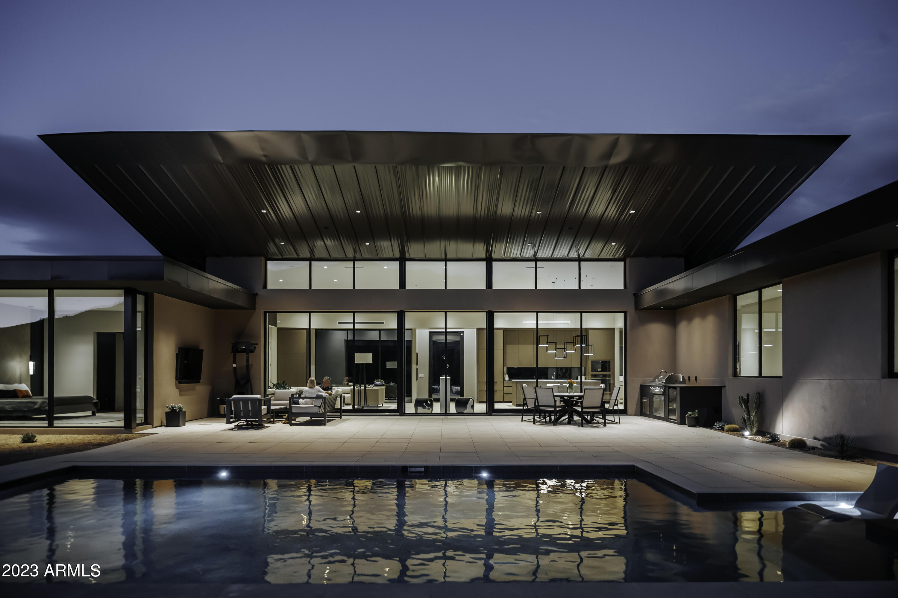 Award winning architect Eric Spry designed this stunning contemporary home on a rarely available fully serviced 1.6 acre view lot in a gated Carefree community. The soaring roof that captures the entirety of Black Mountain, the harmonious interior with exterior design and meticulous construction earned this home a feature in the December 2023 issue of Phoenix Home and Garden. Jaw dropping unobstructed vistas of Black Mountain, mature saguaros and granite boulders greet you at the front door of this 3136 square ft 4 bedroom, 3½ bath masterpiece completed in 2022. The interior is replete with artfully sophisticated details that enhance connection to the outdoors. This home is a triumph in contemporary residential architecture that truly reflects the spirit of the Sonoran desert.