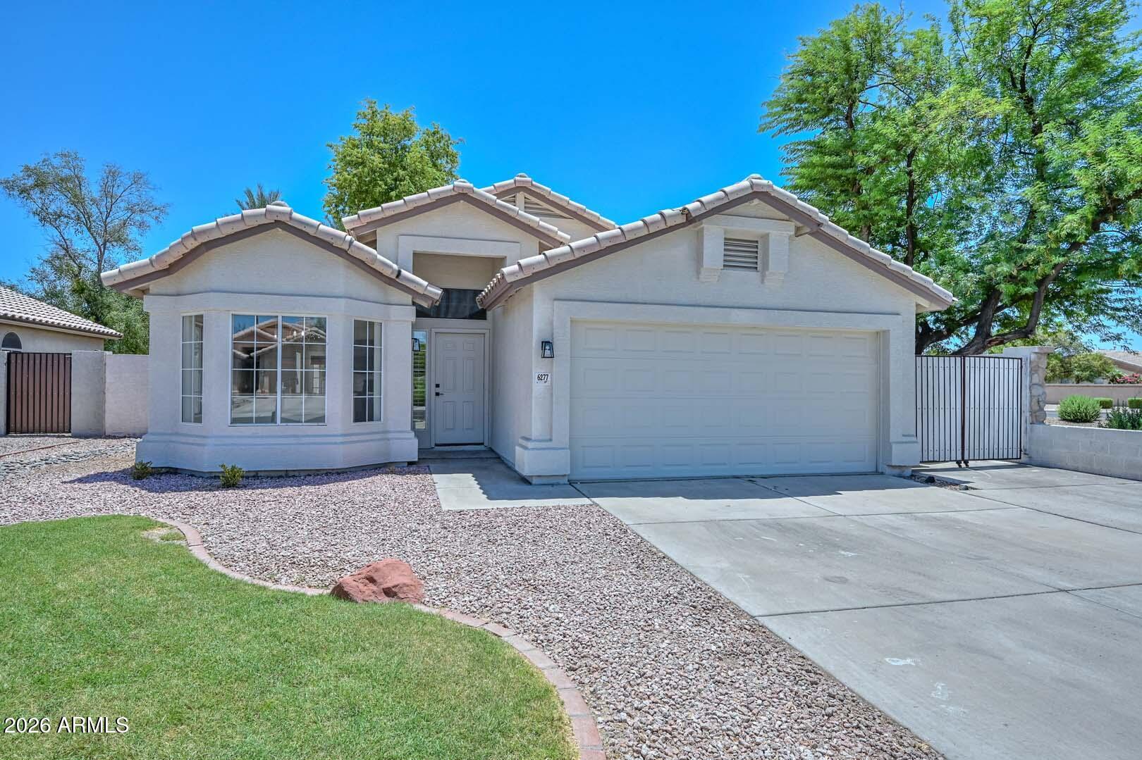Welcome home to this absolutely adorable, updated gem in the highly sought-after Arrowhead Ranch community! Spanning 1,538 square feet, this pristine, move-in-ready residence features an ideal great room floor plan that seamlessly blends daily living and entertaining, anchored by a spacious kitchen.

No detail has been overlooked in this extensive refresh. Step inside to find brand-new carpet and tile flooring, crisp new baseboards, and a flawless, modern interior paint palette complemented by fresh exterior paint. The home boasts thoughtful upgrades throughout, including modernized bedroom doors with premium hardware and stylish new light fixtures.  No detail has been overlooked in this extensive refresh. Step inside to find brand-new carpet and tile flooring, crisp new baseboards and a flawless, modern interior paint palette complemented by fresh exterior paint. The home boasts thoughtful upgrades throughout, including modernized bedroom doors with premium hardware and stylish new light fixtures.
The split floor plan offers 3 generously sized bedrooms and 2 full bathrooms. Outside, your private oasis awaits: a covered patio leads to a massive, lush grassy backyard complete with a built-in barbecue--perfect for weekend gatherings and outdoor fun. Parking and storage are a breeze with a 2-car garage, an expanded 3-car concrete slab driveway, and a convenient RV gate.
Superbly located just minutes from vibrant community parks, top-tier shopping, dining, and excellent freeway access. This turnkey property is a rare find and won't last long!