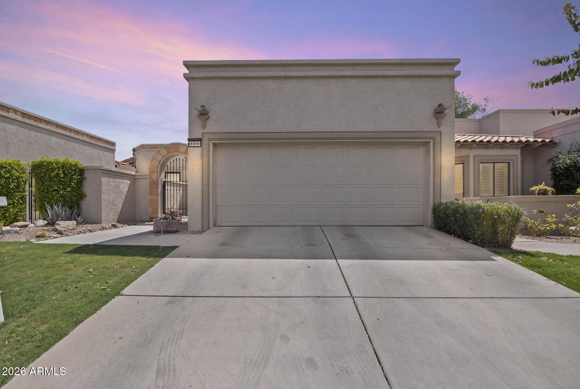 Experience resort-style living in the highly sought-after guard-gated community of Las Palomas in McCormick Ranch! This beautifully maintained single-level townhome offers 3 bedrooms, 2 baths, soaring vaulted ceilings, abundant natural light, and a spacious great room with a cozy wood-burning fireplace. The thoughtfully designed split floor plan features a generous primary suite with walk-in closet, dual vanities, separate tub and shower. Enjoy morning coffee in the private backyard patio and evening gatherings in the charming front courtyard. Residents enjoy two heated pools, tennis and sport courts, lakeside BBQ areas, walking paths, lush greenbelts, bocce ball, shuffleboard, and picturesque water features. Community wired for fiber optic internet.