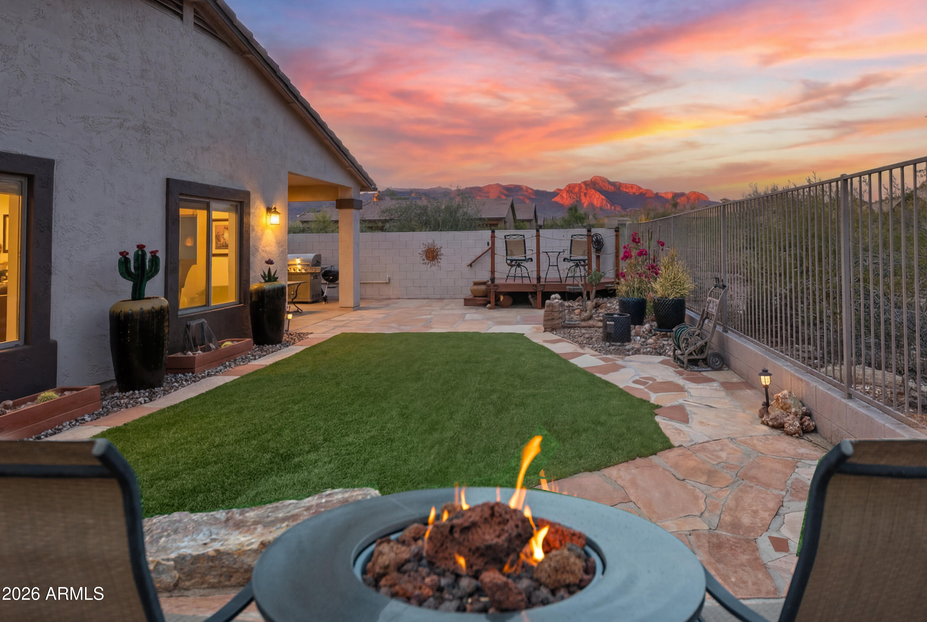 Wow! ***This Fantastic FURNISHED home in SUPERSTITION FOOTHILLS is PRICED TO SELL with a FABULOUS BACK YARD, Great Views & Many Updates! ***Enjoy SUPERSTITION MOUNTAIN VIEWS while relaxing in your NEW HOT TUB overlooking vibrant landscaping with artificial TURF & a PERFECT VIEW DECK for GORGEOUS SUNRISES & SUNSETS! ***You'll appreciate this WELL MAINTAINED HOME offering Tile Flooring t/o,  NEW Exterior Paint (2025), NEW ROOF (2024), NEW HVAC (2016), NEW Hot Water Heater (2018), NEW PVC DRIP SYS (2018), NEW Water Softener (2022), NEW Reverse Osmosis (2021) with line to ice maker + NEW: Refrigerator, Disposal, Landscape Update with New Rock & More!  Convenient Pull-Out Kitchen Shelves & Cool Custom Built-in Entertainment Buffet/Bar/Cabinets too +++ Must See! ***Superstition Foothills is .. ....most sought after subdivisions in Gold Canyon with LOW HOA FEES and RARE AMENITIES including... HEATED COMMUNITY POOL & SPA, Pet-Friendly Park & 52 Fantastic Hiking & Walking Trails ***Additionally, Superstition Foothills is a FIREWISE community! It is one of only 2 Gold Canyon Communities in the national Firewise USA® recognition program! **Walk to Shopping, Dining, Coffee Shops & hiking trails. CHECK IT OUT TODAY! ***Conveniently Located, close to WORLD CLASS HIKING and Gold Canyon Golf Resort, which offers two 18-hole Championship golf courses (Dinosaur Mountain and Sidewinder) and Expansive PATIO DINING with amazing golf and mountain views! ***Nature lovers will ENJOY the nearby 2.9 million acres of Tonto National Forest wilderness, hiking, off-road trails plus four beautiful, pristine lakes too! Conveniently located just 35 minutes from Sky Harbor Airport and 20 minutes from Mesa Gateway Airport and San Tan Village Shopping & Dining! ***You'll LOVE the GOLD CANYON LIFESTYLE!