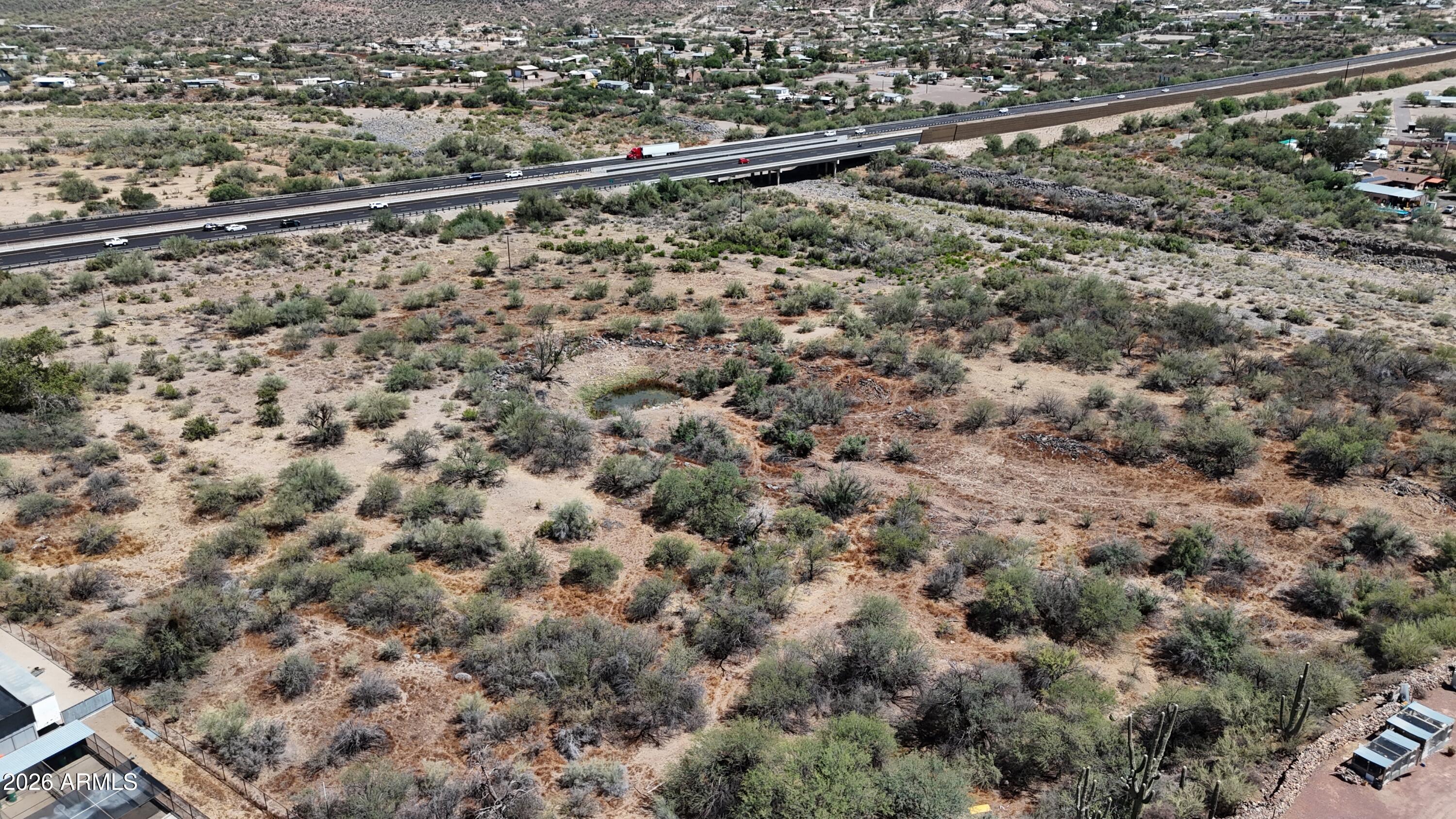 Opportunity awaits on this 7.65-acre parcel in Black Canyon City with electricity already on site. Enjoy sweeping mountain and desert views, abundant native vegetation, and convenient access to I-17.
With plenty of room for a custom home, horse setup, workshop, or investment project, this property offers the flexibility to create your vision while enjoying Arizona's beautiful desert landscape.
Buyer to verify all facts, figures, utilities, zoning, and intended use.