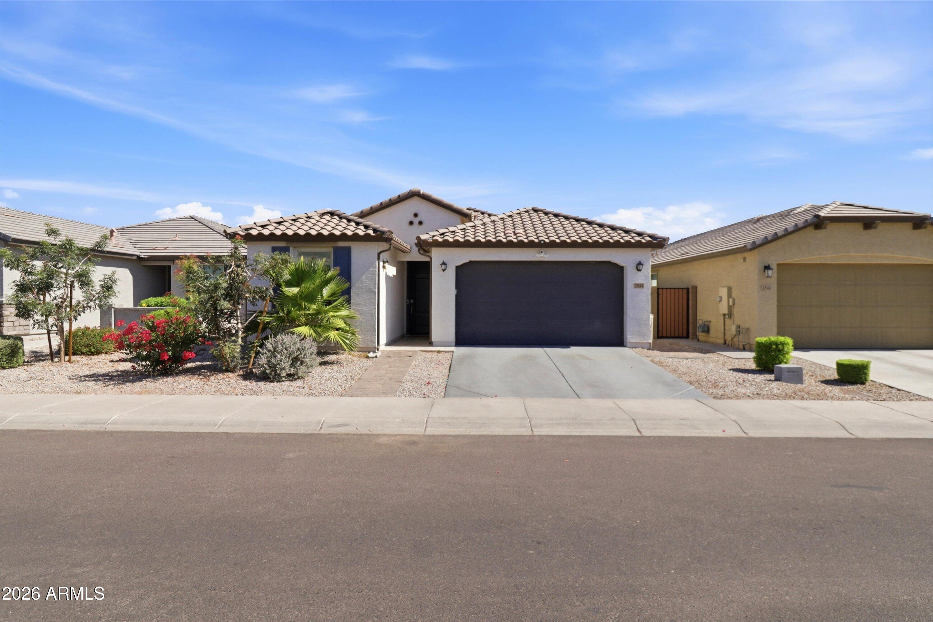 Rare single-level home featuring 5 bedrooms and 3 bathrooms in a desirable gated community with access to parks, basketball courts, and playgrounds. This open-concept floor plan offers a spacious kitchen with granite countertops, stainless steel appliances, abundant storage, and a large island overlooking the living and dining areas. Enjoy the beautifully landscaped backyard complete with extensive paver upgrades, artificial turf, a covered patio, and a storage shed that conveys with the property. All appliances are included. Additional features include wood-look tile flooring, an indoor laundry room, and a 2-car garage. Conveniently located just minutes from Sky Harbor Airport, shopping, dining, and the hiking and biking trails of South Mountain. A rare opportunity to own a move-in ready