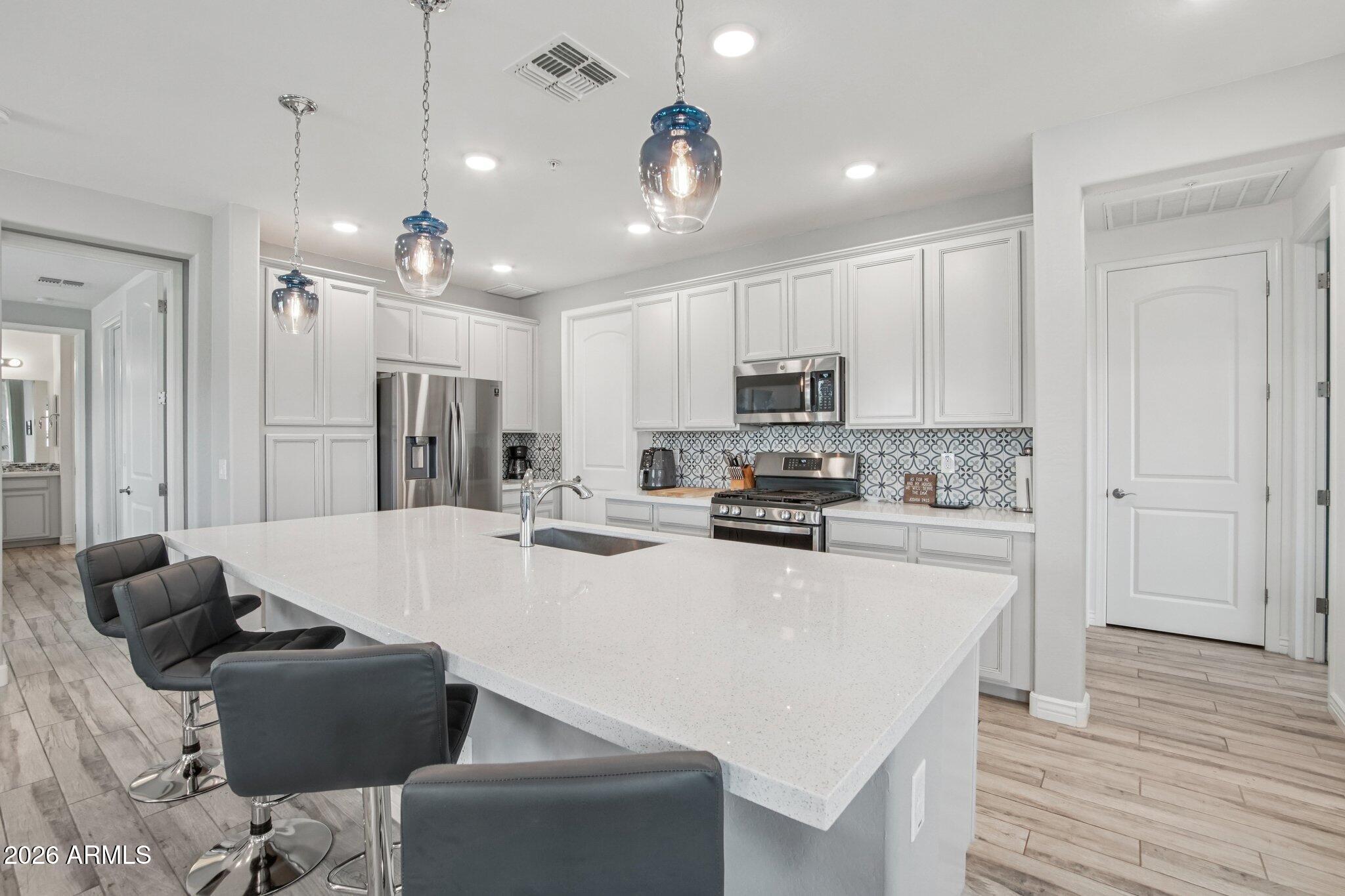 Unbeatable Financing: Assume the existing VA loan at 5.625% with a remarkably low cash-to-close equity gap of only $40,000. Lock in a monthly payment hundreds of dollars lower than current market rates on this pristine, 5-year-old condo. Turnkey Luxury Condo | Fully Furnished | Ready for Immediate Move-In | Rancho North | Cave Creek, AZ
Impeccably upgraded 2-bedroom, 2-bath condo in the gated community of Rancho North--fully furnished and truly move-in ready. This rare end-unit townhouse offers added privacy, abundant natural light, and a modern open-concept split floor plan with 9+ ft ceilings and premium finishes throughout.
The gourmet kitchen features a large quartz island, designer tile backsplash, gas cooktop, and upgraded cabinetry--ideal for both everyday living and entertaining. Key Features: Fully furnished -- just bring your suitcase, Private EV-ready garage +additional parking,
Desirable 2nd-floor end unit for enhanced privacy,
Whole-home water softener,
HOA covers exterior maintenance, landscaping, water & trash,
Resort-style amenities: pool, spa, fitness center, and fire pit.

Prime Location:
Ideally located just minutes from the North Phoenix tech corridor, including Taiwan Semiconductor Manufacturing Company. Enjoy easy access to Cave Creek's renowned golf, hiking trails, dining, and upscale desert lifestyle.

Perfect for: full-time living, seasonal residents, or professionals seeking a low-maintenance, lock-and-leave home.