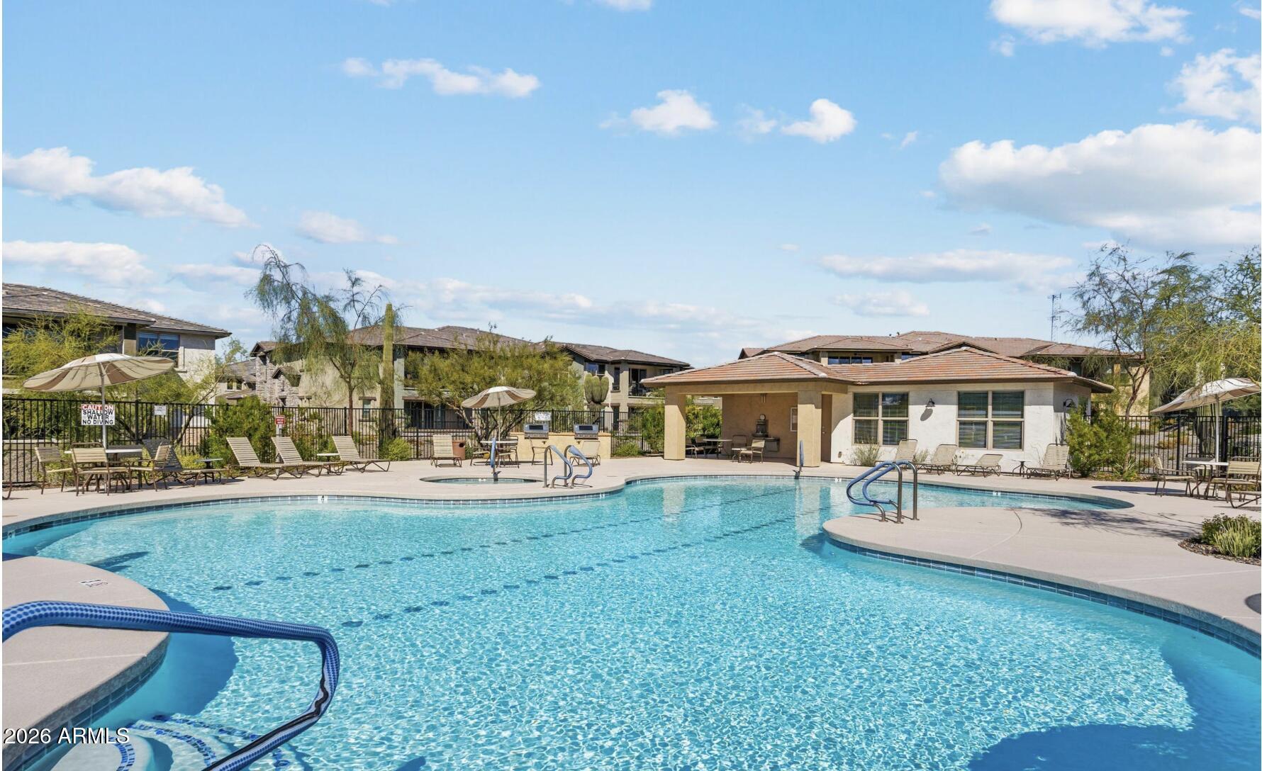 Unbeatable Financing: Assume the existing VA loan at 5.625% with a remarkably low cash-to-close equity gap of only $40,000. Lock in a monthly payment hundreds of dollars lower than current market rates on this pristine, 5-year-old condo. Turnkey Luxury Condo | Fully Furnished | Ready for Immediate Move-In | Rancho North | Cave Creek, AZ
Impeccably upgraded 2-bedroom, 2-bath condo in the gated community of Rancho North--fully furnished and truly move-in ready. This rare end-unit townhouse offers added privacy, abundant natural light, and a modern open-concept split floor plan with 9+ ft ceilings and premium finishes throughout.
The gourmet kitchen features a large quartz island, designer tile backsplash, gas cooktop, and upgraded cabinetry--ideal for both everyday living and entertaining. Key Features: Fully furnished -- just bring your suitcase, Private EV-ready garage +additional parking,
Desirable 2nd-floor end unit for enhanced privacy,
Whole-home water softener,
HOA covers exterior maintenance, landscaping, water & trash,
Resort-style amenities: pool, spa, fitness center, and fire pit.

Prime Location:
Ideally located just minutes from the North Phoenix tech corridor, including Taiwan Semiconductor Manufacturing Company. Enjoy easy access to Cave Creek's renowned golf, hiking trails, dining, and upscale desert lifestyle.

Perfect for: full-time living, seasonal residents, or professionals seeking a low-maintenance, lock-and-leave home.