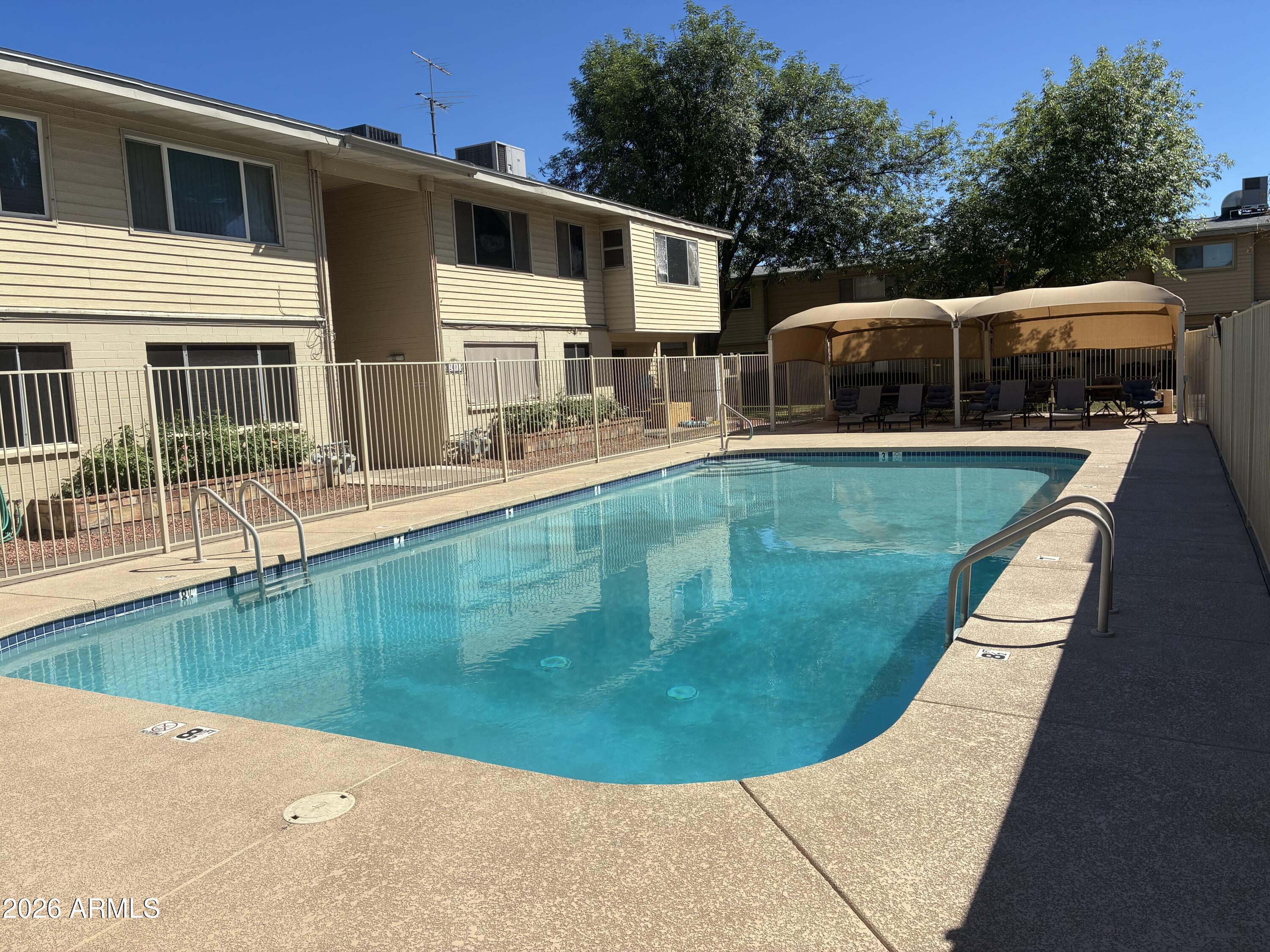 Economical studio upstairs unit with brand new carpet and an enclosed balcony in the Bahama Community, just 2 miles from GCU, 12 minutes to Downtown Phoenix, and easy I-17 access. Community pool, manicured grounds, & gated access. Perfect for retirees, first-time buyers or students! Priced for quick sale! Sorry no pets.