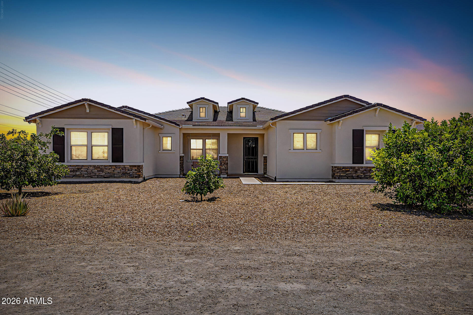 Stunning Custom home on 1.25 Acres, No HOA!Discover the perfect blend of modern luxury and rural freedom in this magnificent 3,090 sq. ft. custom-built home. Situated on a sprawling 1.25 acre lot in San Tan Valley, this 2020 built masterpiece offers the space and privacy you've been searching for, all without the restrictions of an HOA.Step inside to an expansive single level floor plan designed for both high end entertaining and comfortable daily living.Gourmet Chef's Kitchen: The heart of the home features a massive center island, sleek quartz countertops, and premium shaker style cabinetry. Fully equipped with stainless steel Bosch  appliances and a spacious walk-in pantry. A massive 4 car garage provides ample storage, a wide RV gate, and two dedicated covered carports, icluding an oversized RV height structure for covered RV storage, trailers, boats or recreational vehicles. This property also has a well prepared expanded utiltiy use for a future shop with substantial infrastructure already in place. Features include a dedicated 200- amp panel at the rear of the property, 100 amp service run to the RV carport, underground water service, underground RG6 and CAT 6 wiring and an RV dump connected to a secondary septic system originally installed for a future shop build. Outdoor Living: Relax under the oversized covered patio overlooking a fully fenced backyard, perfect for creating your own private oasis.Horse Property: Bring your animals! This lot is horse-friendly and offers the perfect canvas for stables or arenas. Perfect access to shopping, dining, and easy access to freeways nearby.