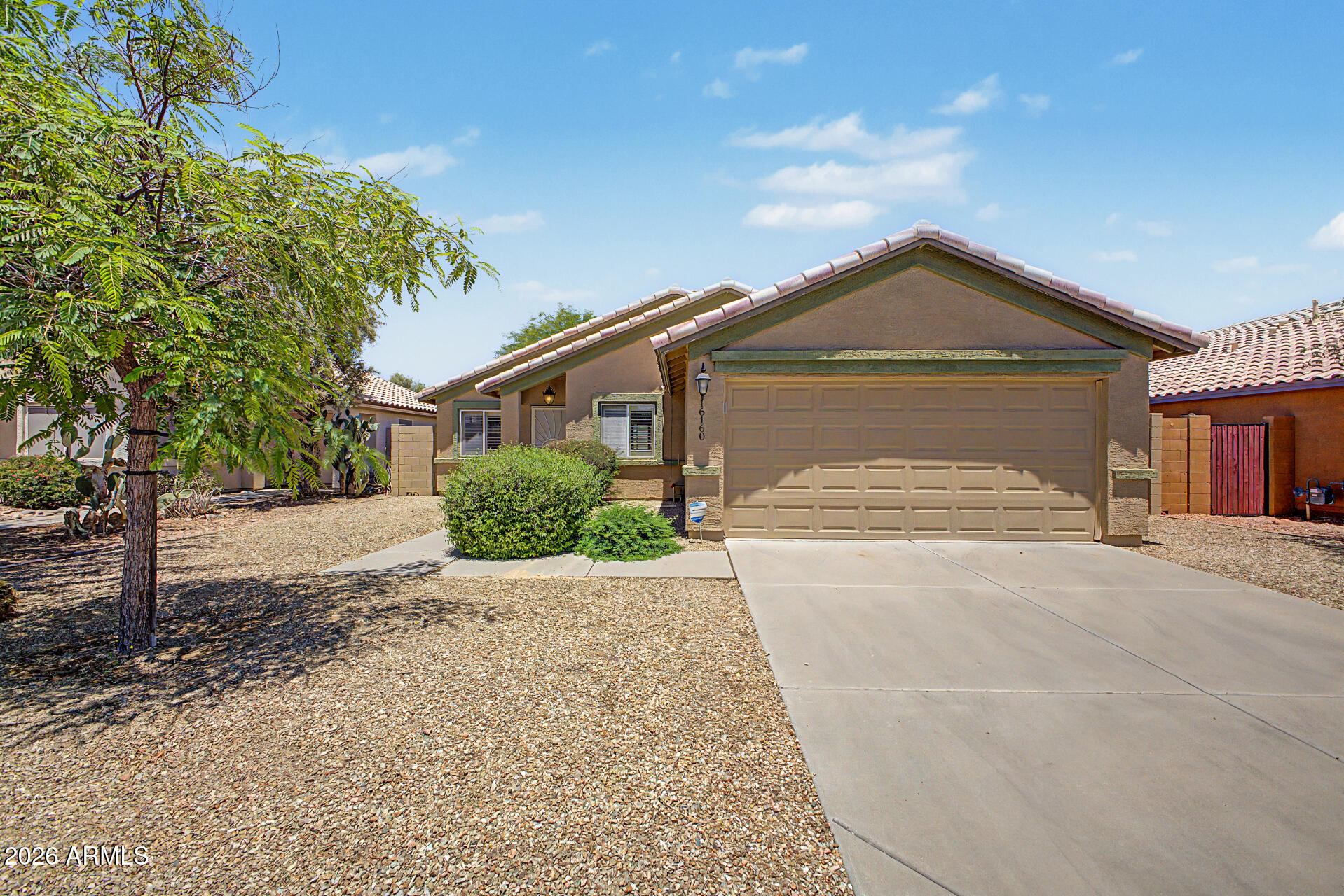 Seize the chance to own this charming 3-bedroom, 2-bath home in Wildflower Ranch! You're welcomed by an inviting living room with vaulted ceilings, a soothing palette, classic plantation shutters, and a harmonious blend of soft carpeting and tile flooring. Cook delicious meals in the eat-in kitchen, equipped with wood cabinetry, contemporary track lighting, and essential built-in appliances. The cozy primary bedroom includes a private bathroom and a walk-in closet with mirrored doors that enhance the sense of space. Unwind at the end of a long day in the sizeable backyard, complete with a covered patio, perfect for dining al fresco or refreshing drinks. Don't miss your chance to own this adorable gem!