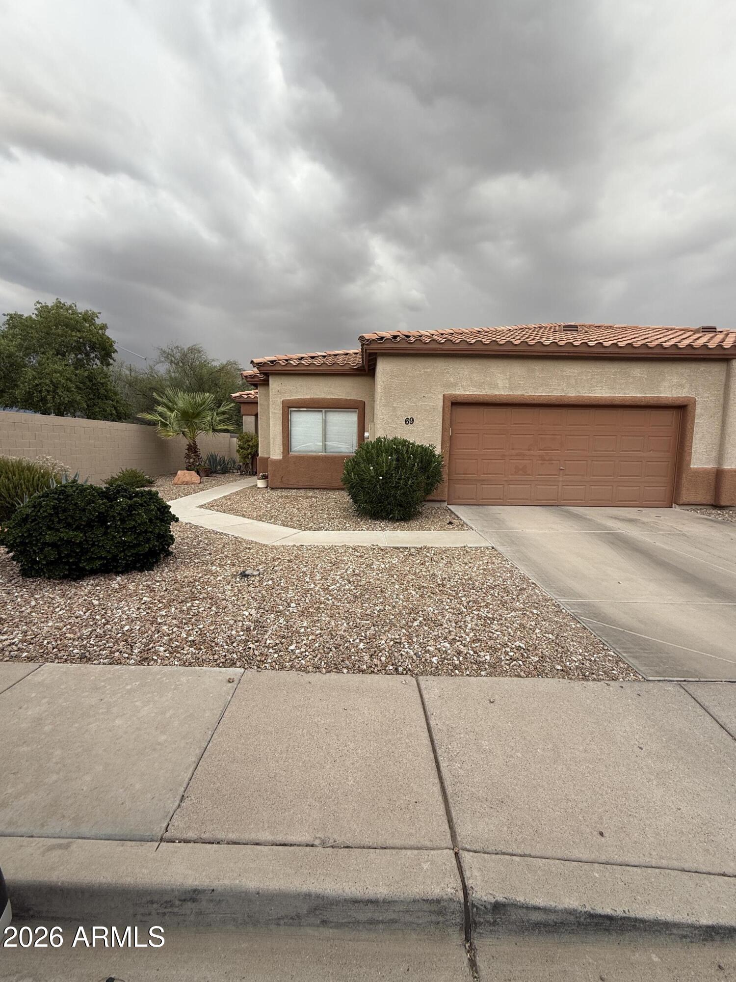 Welcome home to this great one story split floorplan 2 bedroom, 2 bathroom home with a den located in a private gated community. This home was updated with granite countertops and new kitchen sink in 2024, a new HVAC system in 12/24 and a new roof in 6/2025. This home has a great size master bedroom with ensuite bathroom that features a tub/shower combo, a walk in closet, double vanity and a water closet. The second bedroom is also a great size and is located right next to the hallway bathroom. Also featuring a 2 car garage, this home is ready for immediate move in.