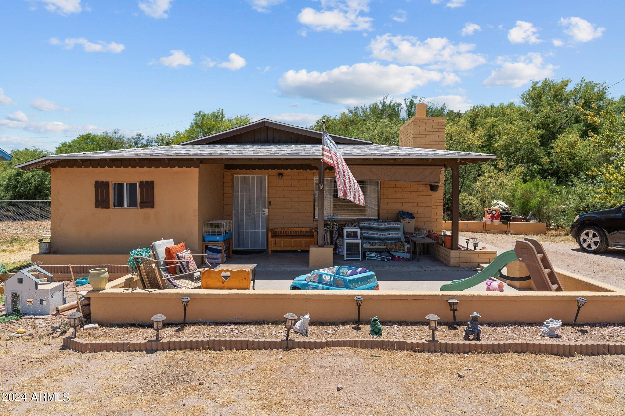 Discover charm and convenience in the heart of Wickenburg!! This 3 bed, 2 bath home boasts a spacious family room featuring a wood burning fireplace. Enjoy the luxury of two master bedrooms, a kitchen with tile flooring, and recent upgrades including laminate flooring, carpet, and a new roof. Situated on a large lot, this property offers endless possibilities and ample parking for all your toys and vehicles.