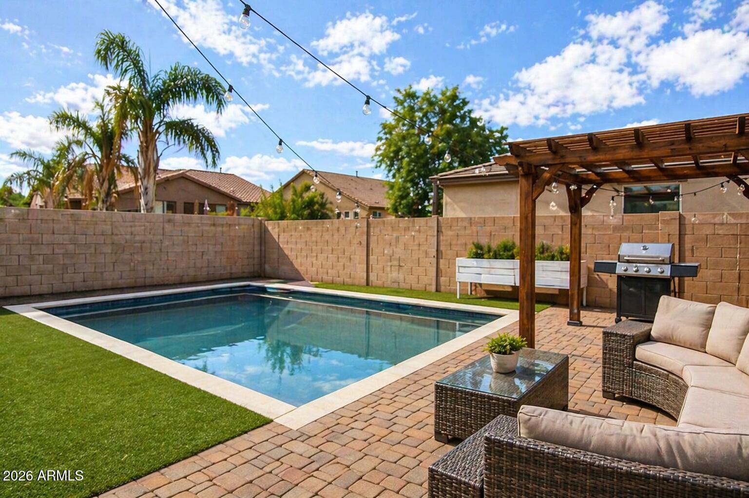 Enjoy easy Arizona living in this beautifully maintained  3 bedroom home featuring a bright, open-concept layout with flex/office space and stylish upgrades throughout. The kitchen is the heart of the home with beautiful countertops, ample cabinetry, and a spacious island perfect for gathering. Relax in the inviting living spaces or unwind in the comfortable bedrooms designed for everyday living. Step outside to your private backyard oasis complete with a sparkling pool and low-maintenance landscaping--perfect for entertaining or quiet evenings at home. Clean, well-cared-for, and truly move-in ready, this home is ready for its next owner. Lock in today's price now!
