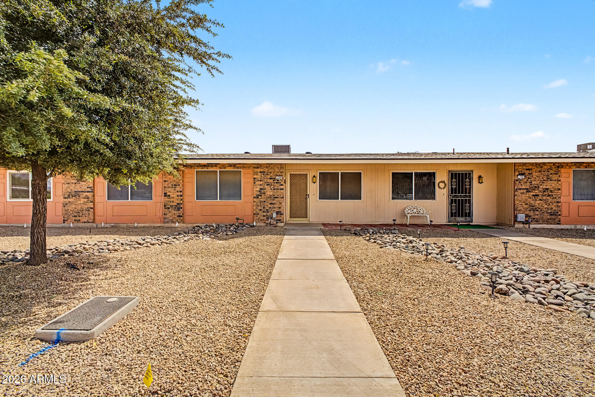 Beautifully remodeled rare 3-bedroom, 2 bath townhome in the highly sought after active adult community of Sun City! This move-in ready home features spacious living areas, an enclosed Arizona room for year-round enjoyment and numerous recent upgrades including a new roof, newer AC, new flooring, new cabinetry and new gorgeous Silestone countertops. The updated kitchen comes complete with all appliances including washer & dryer. With plenty of room to spread out to enjoy both indoor and outdoor living, this home offers comfort, style and convenience. Enjoy all the Sun City amenities including golf, recreation centers, pools, fitness facilities, clubs and more!