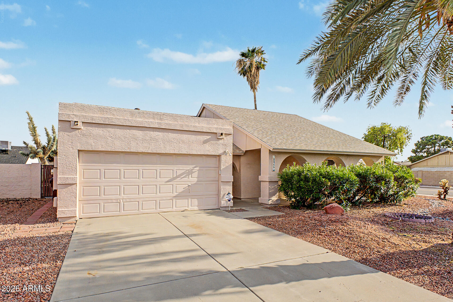 SINGLE STORY - CORNER HOME - NEWER ROOF - NO HOA Well cared for home with easy maintenance landscaping. This home is ready to move in. Inside you'll find vaulted ceilings, a spacious great room with wood-burning fireplace, ceramic tile in the main living areas and a desirable split floor plan. The kitchen offers plenty of cabinetry, pantry, generous counter space and all the appliances including the refrigerator.  Large owner's suite with more vaulted ceilings, walk in closet and wood floors. Other bedrooms boast walk in closets and ceiling fans too. Climate controlled Arizona room includes bar and hobby room. Backyard includes a large extended patio, durable shed and mature trees. Pool was filled in but decking is still intact. Future pool for you?