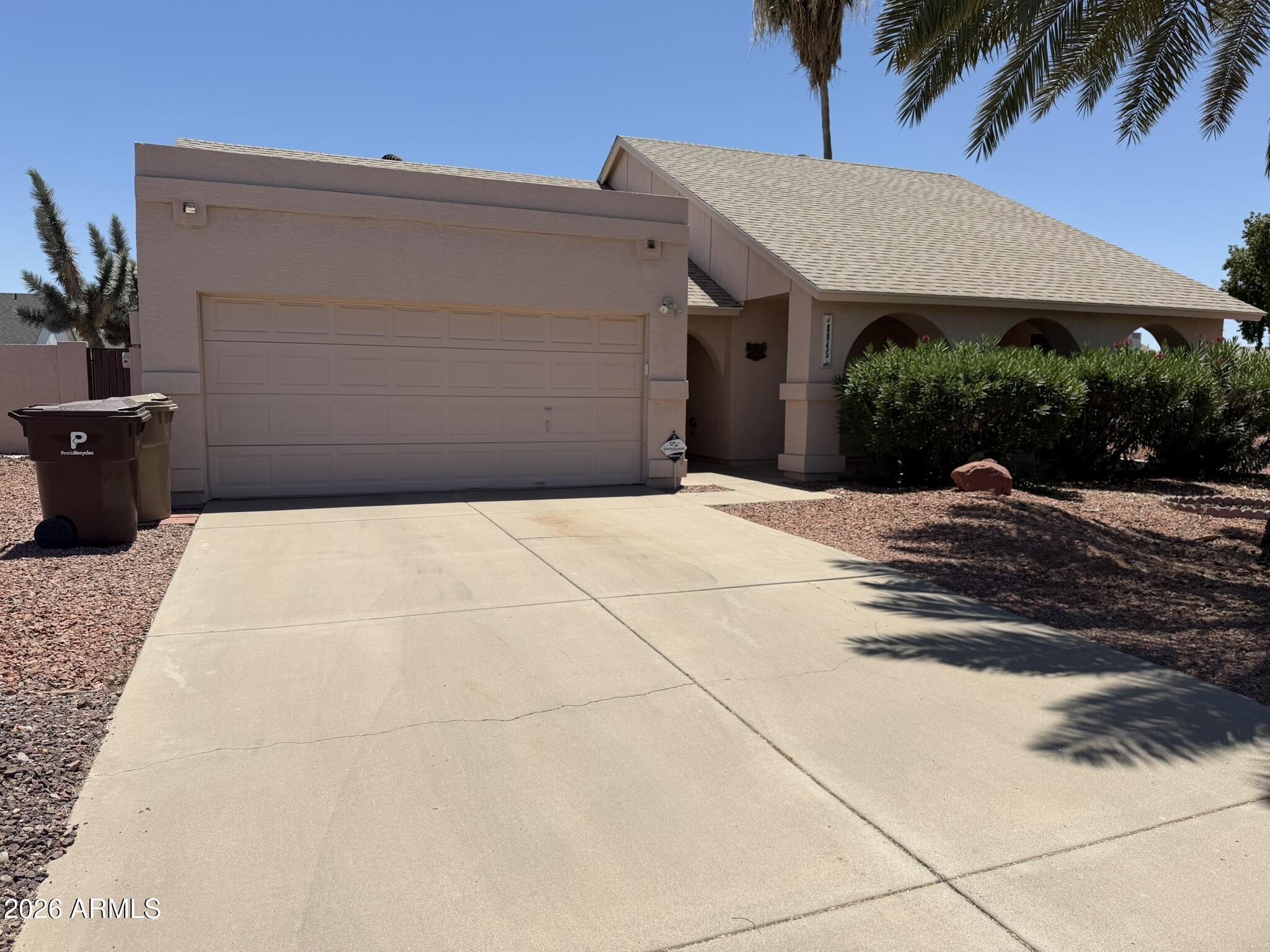 SINGLE STORY - CORNER HOME - NEWER ROOF - NO HOA Well cared for home with easy maintenance landscaping. This home is ready to move in. Inside you'll find vaulted ceilings, a spacious great room with wood-burning fireplace, ceramic tile in the main living areas and a desirable split floor plan. The kitchen offers plenty of cabinetry, pantry, generous counter space and all the appliances including the refrigerator.  Large owner's suite with more vaulted ceilings, walk in closet and wood floors. Other bedrooms boast walk in closets and ceiling fans too. Climate controlled Arizona room includes bar and hobby room. Backyard includes a large extended patio, durable shed and mature trees. Pool was filled in but decking is still intact. Future pool for you?