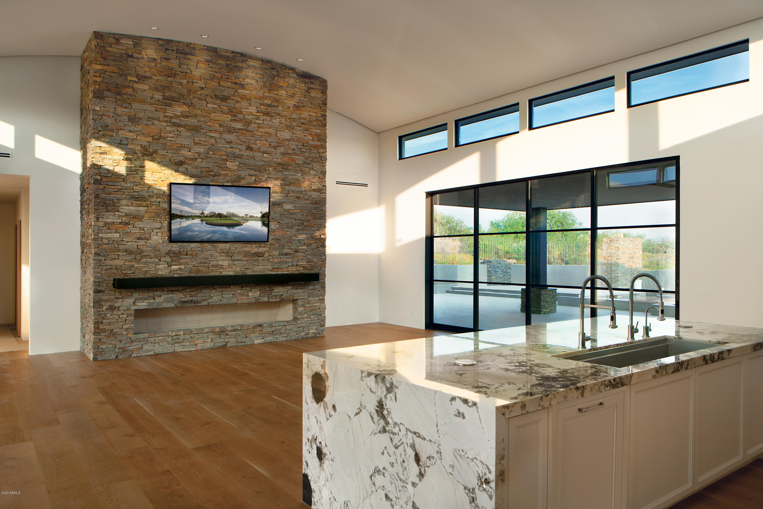 COMPLETION SEPTEMBER 2020.....Another beautiful new build by Salero Homes. Warm contemporary with glass curtain walls that account for magnificent views of the Apache Course, down valley lights, and the Continental Mountains with a thoughtful arrangement that offers privacy and light. Four full ensuites and an open great room featuring a spacious and well-appointed kitchen and private dining room. Views from every room define this transitional home nestled between fairways.  Membership is not included but available through the Desert Mountain Club.