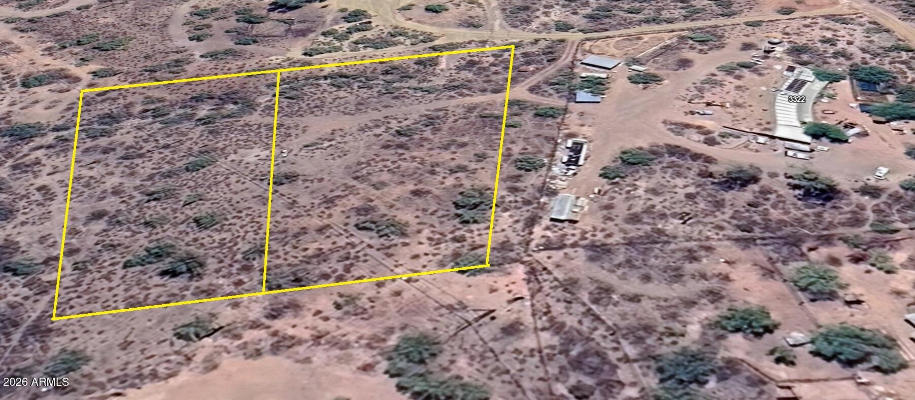 2 acres are for sale with shared well and electricity. The zoning is one house per acre.