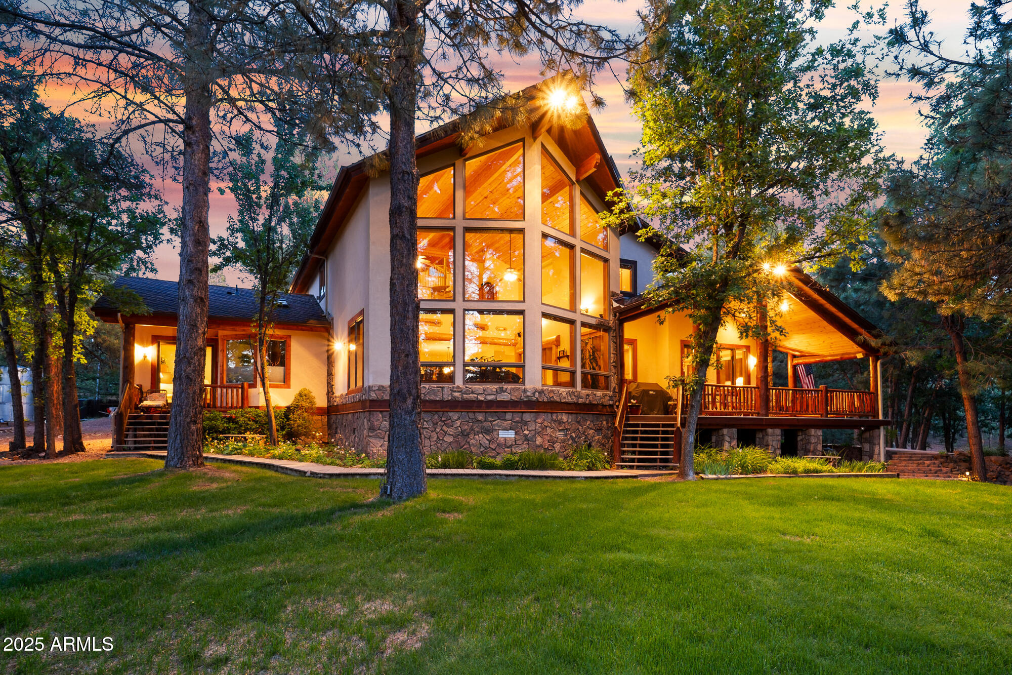 This one-of-a-kind custom home in the White Mountains of Arizona is a must see!  The home is built with energy-efficient Structural Insulated Panels (SIPs) designed to bring you year-round comfort. Andersen windows and doors throughout, a Whole House Fan and SIPs ensure excellent insulation through every season.
The main home features and oversized attached garage and enjoy step-free entry.  In the front, a cement circular drive leads to a front staircase and wrap-around decking.
Inside an entry foyer opens to a formal living room which includes a beautiful gas fireplace surrounded by custom cabinetry bookcases.  
You are then led to a generous kitchen with large pantry equipped with stainless steel appliances; refrigerator, double ovens, 5 burner gas cooktop, trash compactor, see more double sink plus a veggie sink. The expansive great room features a wood-burning stove for efficient and warm heating, a two-story wall of windows offering sweeping views of the forest and sunsets and access to the main deck for leisure activities.  
The primary suite offers a jetted tub, luxury shower, dual walk-in closets and a private deck allowing for some quiet solitude.  Also, on the main floor is an office/den and a laundry room.  Upstairs are three additional bedrooms, a full bath and a loft-style living area.  All bedrooms and living areas have vaulted ceilings and ceiling fans.
Additional Features:
Private well plus Arizona water hook-up
Roof sprinklers for fire safety
Natural gas for heating, stove, 2 50 gallon water heaters & barbecue
Landscaped yard with large lawn, fire pit seating area and a sand-filled children's play area for lots of outdoor fun
Workshop and Bunkhouse
A 60' x 40' shop includes 220 v wiring, 2 storage lofts, double bay roll up doors and a full bathroom.  Lots of room to work and store tools , tractors, RV's and mountain toys.
Above is a 55' x 20' bunkhouse fully furnished with a kitchenette and a full bathroom - ideal for overflow guests.
Outside is a large cemented parking area, two full RV hookups and plenty of extra gravel parking.

An adjacent 1.5 acre parcel is available for separate purchase or may be discounted if buyer wants the entire package.

This meticulously maintained property is a rare find, offering privacy, comfort and stunning views of all four beautiful seasons the White Mountains has to offer.
The roof was replaced in August of 2016