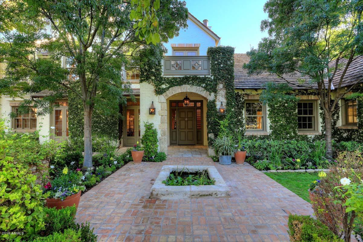 This phenomenal English Country residence with its premier location on Exeter is like no other and was created by Architect, Mark Candelaria, built by Nance Construction and the Interiors by David Michael Miller.  The architectural details never end and the finest craftsmanship was performed in this stunning property.  The ambience felt is incomparable the moment you pass through the over 250 year old entry gates from an English Manor and the oak trees flanking the distinctively paved driveway.  Several of the many highlights include plaster walls, Christopher Peacock cabinetry, leaded glass windows detailed with lead and hand scraped quarter sawn oak floors installed by an artisan of the Shutters Hotel, Santa Monica.  Main home 8,655 sqft; Guest house 1,124 sqft.