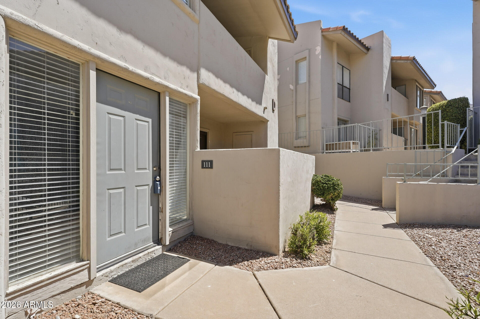 Fabulous poolside condominium in the Mountain Park Condominium Community. Two bedroom and One 3/4  bath split floorplan with wood and tile floors. The floor plan is open and spacious. Very Light with a fireplace for cozy winter evenings. Located near the sparkling community pool, jacuzzi and BBQ grill area. Great location near shopping, dining and the squaw peak parkway! This north central phoenix location is one of the best. The sky harbor airport is very close as well!