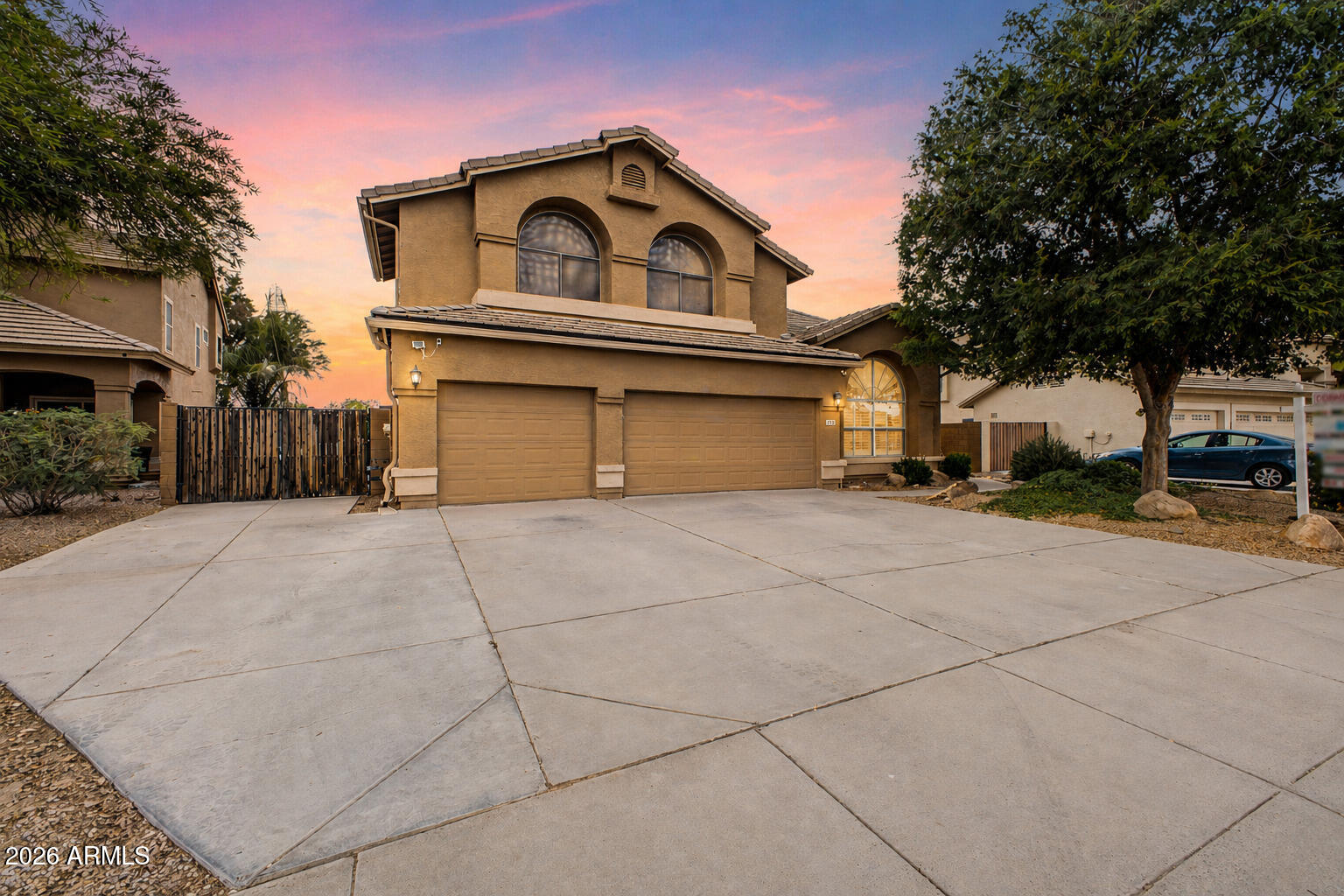 This stunning 6-bedroom home is located in the highly desirable Gilbert Ranch neighborhood, minutes from San Tan Village. Majorly updated -- new roof (2021), new AC units (2023), new variable speed pool pump (2025), and freshly painted interior. Inside, soaring ceilings and a grand entryway set the tone. The kitchen features stainless steel appliances, granite countertops, and ample cabinetry. A main-floor bedroom and full bath offer flexibility for guests or multi-generational living. Upstairs, the primary suite includes a walk-in closet and spa-like bathroom with double sinks and separate tub and shower. A loft with a private balcony overlooking the greenbelt adds great versatility. Out back, enjoy a pool, RV gate, RV parking with 50 amp hookup, and no rear neighbors. Garage has a mini split -- perfect for a workshop or gym.