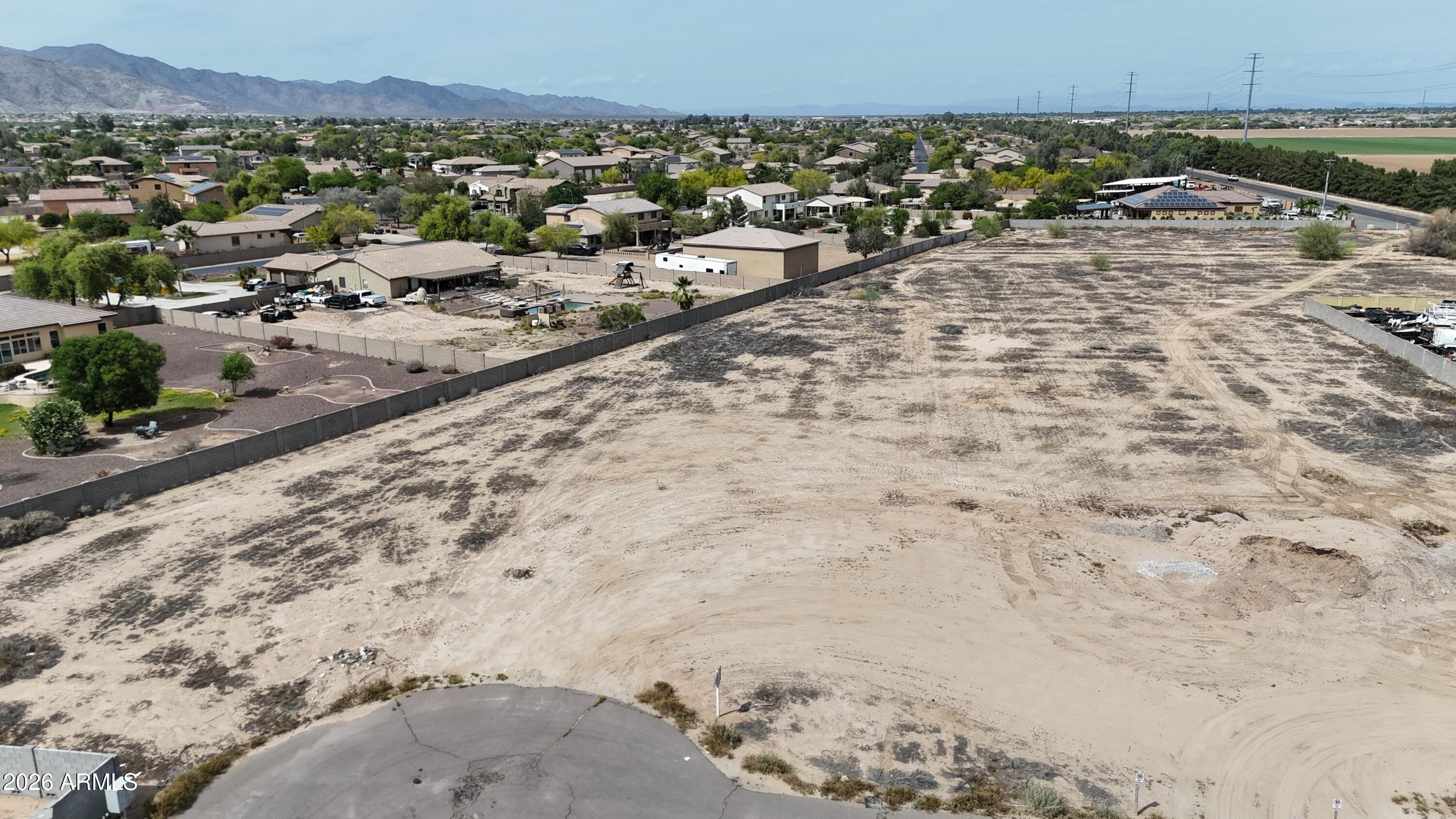 Welcome to a wonderful opportunity to own approximately 47,285 square feet (1.086 acres) of vacant land tucked into a peaceful cul-de-sac community in beautiful Litchfield Park, Arizona. With room to breathe, dream, and design, this spacious parcel invites you to bring your vision to life in one of the West Valley's most charming and established areas.
Zoned R-43 per Maricopa County, the lot is surrounded by lovely residential properties. Buyers are encouraged to perform their own due diligence to determine whether the property can be developed for residential or commercial use. Buyers should also consider the existing overlay restriction introduced by Luke Air Force Base, which may affect development plans.