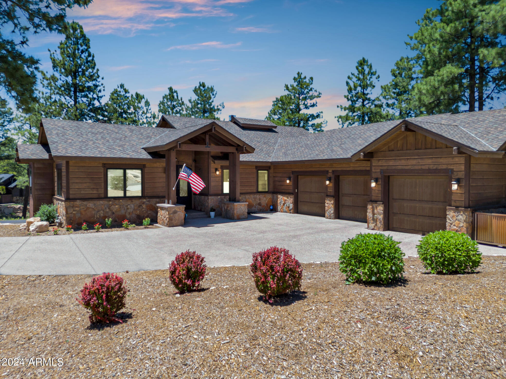 Welcome to your next home located in the coveted Pine Canyon community. This custom home is the perfect opportunity for a mountain retreat to entertain family and friends. At 5,303sqft this home includes 4 bedroom, 4 full, and 2 half baths, large flex room, plus a massive walkout basement, and is perfectly situated in the heart of Pine Canyon.
Lot is currently split from adjoining lot and can be purchased with a separate transaction. Park your vehicles and fun toys in this oversized 1,000sqft 3 car garage, equipped with EV charger. Walk inside to a large mud/laundry room filled with additional storage.  Hang a right and enter your primary suite where you are greeted with a beautifully curated on-suite bath with dual vanity, soaking tub, large walk-in closet and an elegantly tiled floor to ceiling walk-in shower. The primary bedroom offers a wrapped stone fireplace reaching up to a wood beam ceiling, and private access to the main level deck.  As you enter the main level living area you must stop and admire the stunning chef's kitchen with dual islands, Cove dishwasher, wine fridge and a Wolf Subzero appliance package that is sure to impress.  If you can take your eyes off of the kitchen, take a minute to appreciate the large living area with stone floor to ceiling fireplace, hickory wood floors, and multiple pocketing sliders leading out to a built-in BBQ which is anchored by a gorgeous Trex deck with custom iron railing.  Add on a beautiful entry foyer with custom arched front door, powder bath, and an additional on-suite guest room to round out this magnificent main level. 
If that wasn't enough head downstairs to a large walkout basement that is a party planners dream. Featuring a custom stamped concrete floor, wet bar with cooling drawers and pantry, large living area, powder bath, and two additional on-suite bedrooms. Add on an additional flex room located strategically off of that massive family room and the options are endless - game room, study, office, library, man cave, you pick it and make it your own. 
Additional features include: security system with hard wired cameras, two-way Hunter Douglas blinds, downstairs closet equipped for stackable washer/dryer allowing for a 2nd laundry space, two tankless gas water heaters with recirculating pumps and soft water system, two furnaces, two air condensers. 
Golf cart and Most furniture and furnishings available on a separate bill of sale or included with acceptable offer.