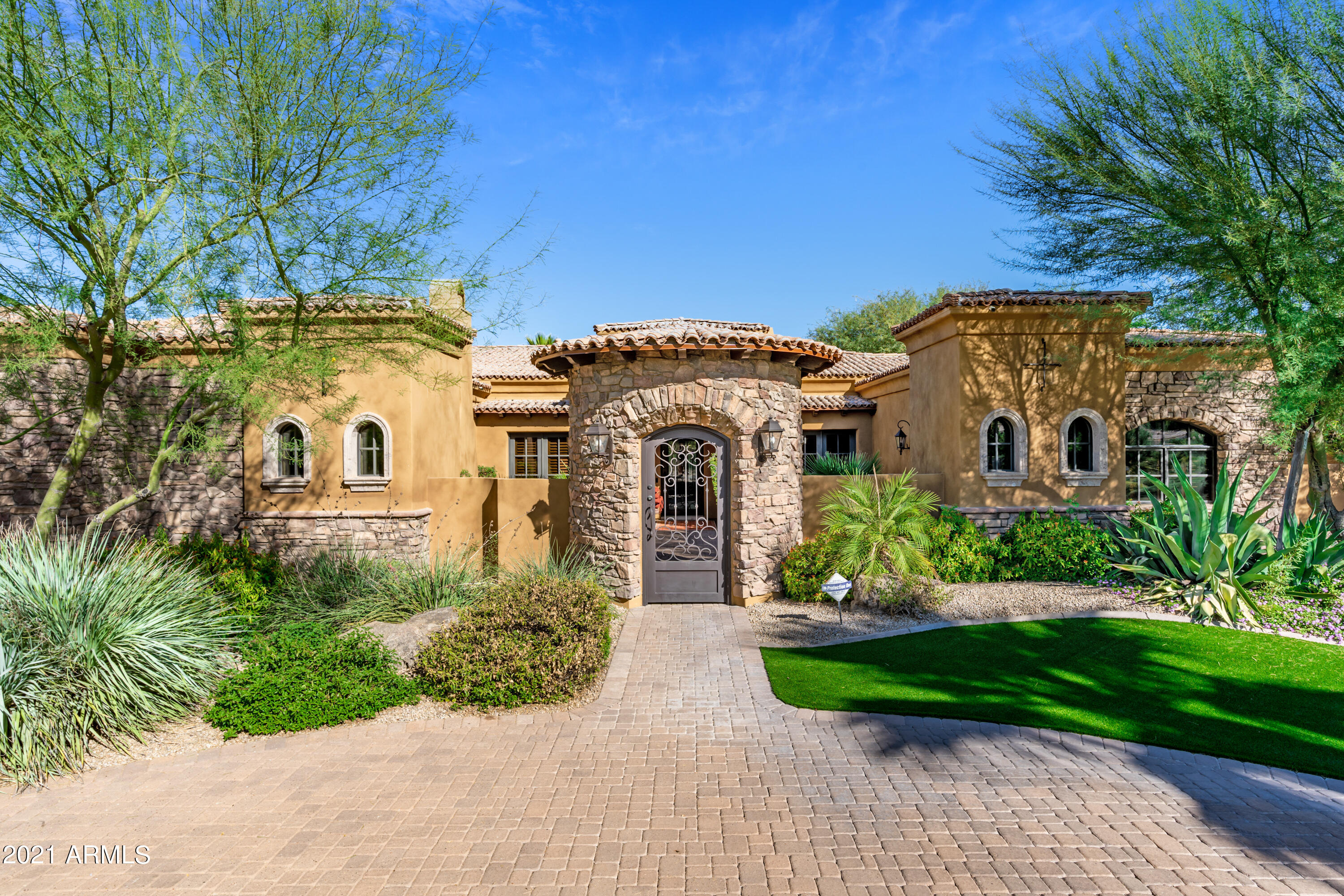 **ENDLESS OPPORTUNITIES - FABULOUS LOT/LOCATION**
Inviting courtyard w/ new artificial turf welcomes you in to this timeless home-
5450 sq.ft  main house features open floorpan + 850 sq.ft casita w/ FULL kitchen.    5 bedroom 5.5 baths - huge master suite with his/hers walk in closets & vanities . Access to courtyard from master as well as from the office/den. Four car garage with epoxy floor & lots of storage. Amazing backyard oasis includes:Guest house comprised of living area, large bedroom , bath & Kitchen with electric appliances + own AC unit  , water heater & Washer/dryer. Bike path approx. 400' around entire perimeter of backyard! Sport court, gorgeous Pebble Tec pool with water feature & in ground spa, outdoor bbq, & firepit