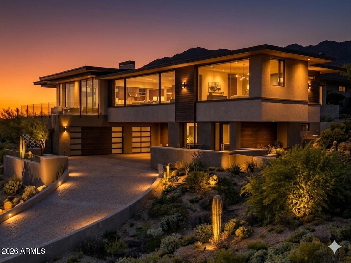 The highest point in Estancia -- and it shows. This stunning new construction modern estate by award-winning architect Craig Wickersham, AIA (Taliesin West) and built by Starwood Custom Homes commands unobstructed 360° views of Pinnacle Peak, Tom Fazio golf course, mountains, city lights & the full Sonoran Desert horizon from every room. 4,950 SF, 5 ensuite BD, 45full BA, 1 half BA, private elevator, 3-car garage. Second office/media room. Separate casita. Resort pool & spa. Guard-gated Estancia -- home to one of America's top-ranked private golf clubs. Golf membership not included.