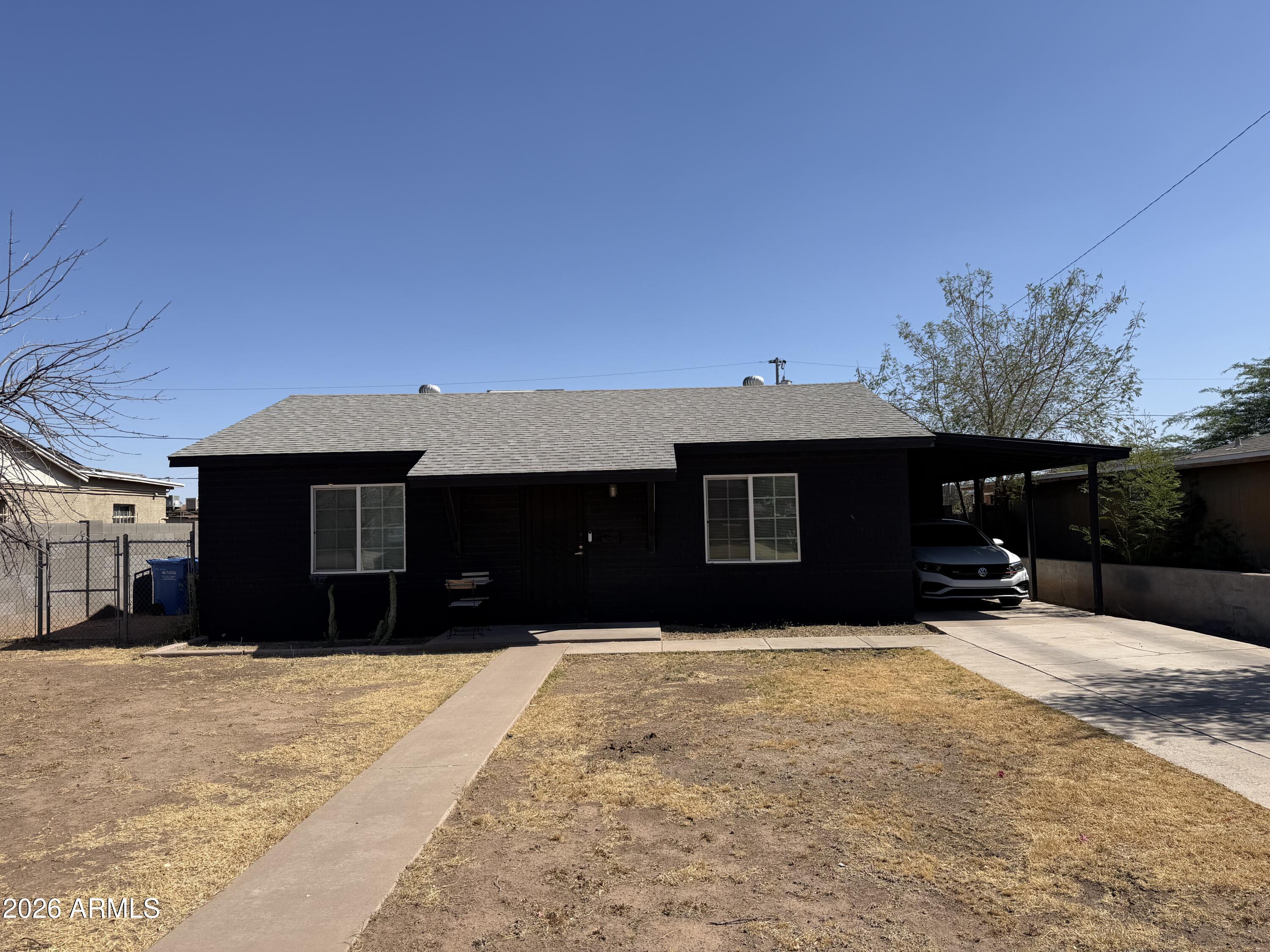 Investor special with tons of potential in the heart of Phoenix! This 2-bedroom, 1-bath home sits on a spacious lot and offers a functional layout, extended driveway, and covered carport. Conveniently located near Downtown Phoenix, Sky Harbor Airport, shopping, dining, and major freeway access. Property is being sold AS-IS and is in need of TLC, making it a great opportunity for investors, flippers, or buyers looking to renovate and add their personal touch. Don't miss the chance to bring new life to this centrally located property!