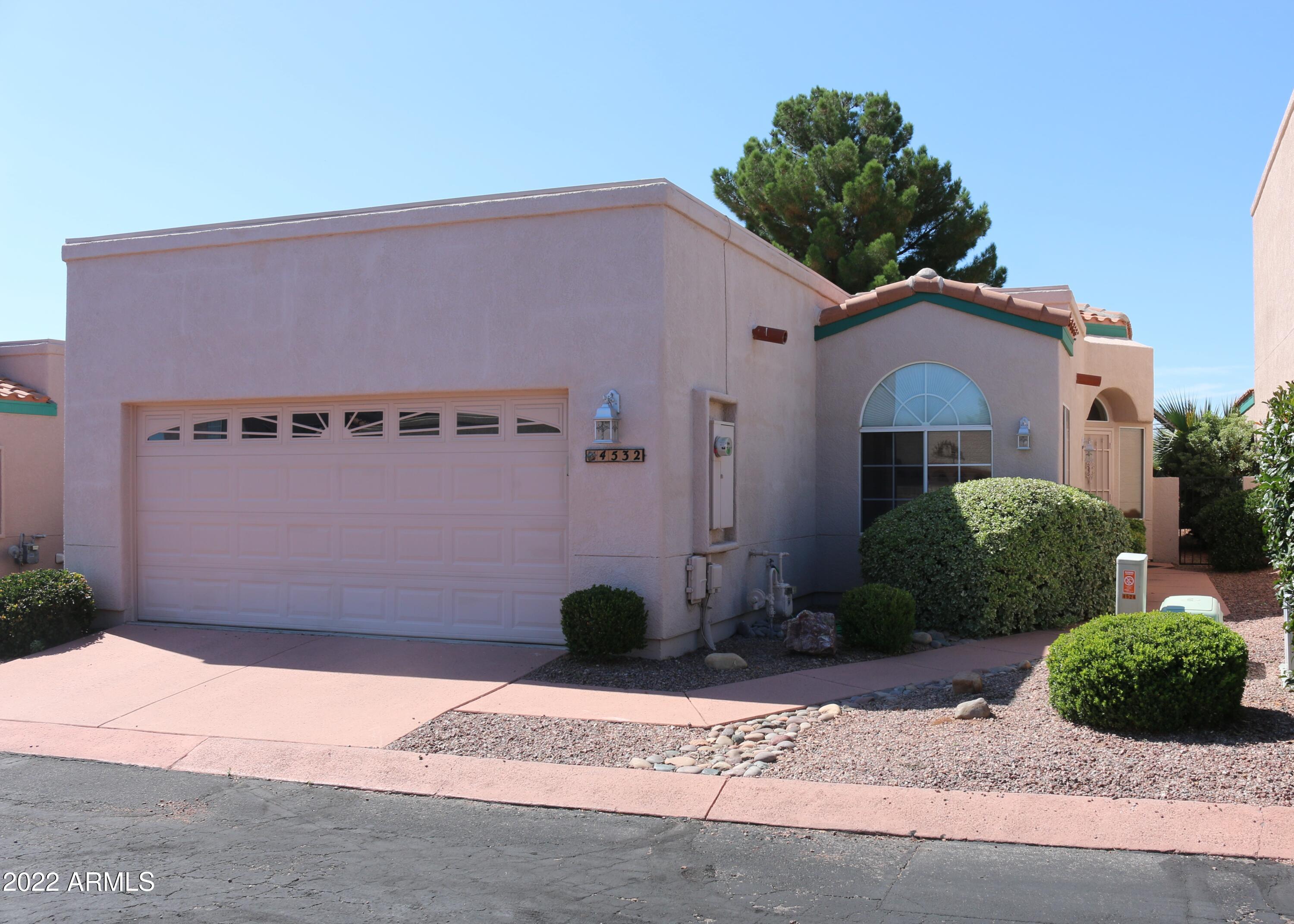 Beautiful upgraded home in a Gated Community with access to the community pool. Two bedrooms with Office/Den (the Den is currently being used as the 3rd bedroom). Home has been well maintained.  New HVAC system will be installed.  Back yard features easy maintenance landscaping with covered patio. Front yard is maintained by the HOA. Refrigerator, washer/dryer, living room furniture, and three bedroom sets remain. Centrally located with close proximity to shops and restaurants.