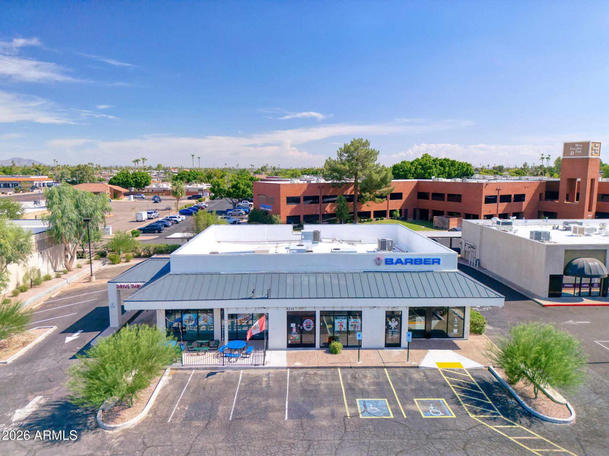 Great location for a retail business.  You can either buy the building and retain tenants (6%) Cap rate, or use as owner user. Presently a restaurant and barber shop. Stand alone building with drive through for the restaurant.  Good lighting, tile floors, bright and inviting furniture, and remodeled in 2022. This is a very busy area.