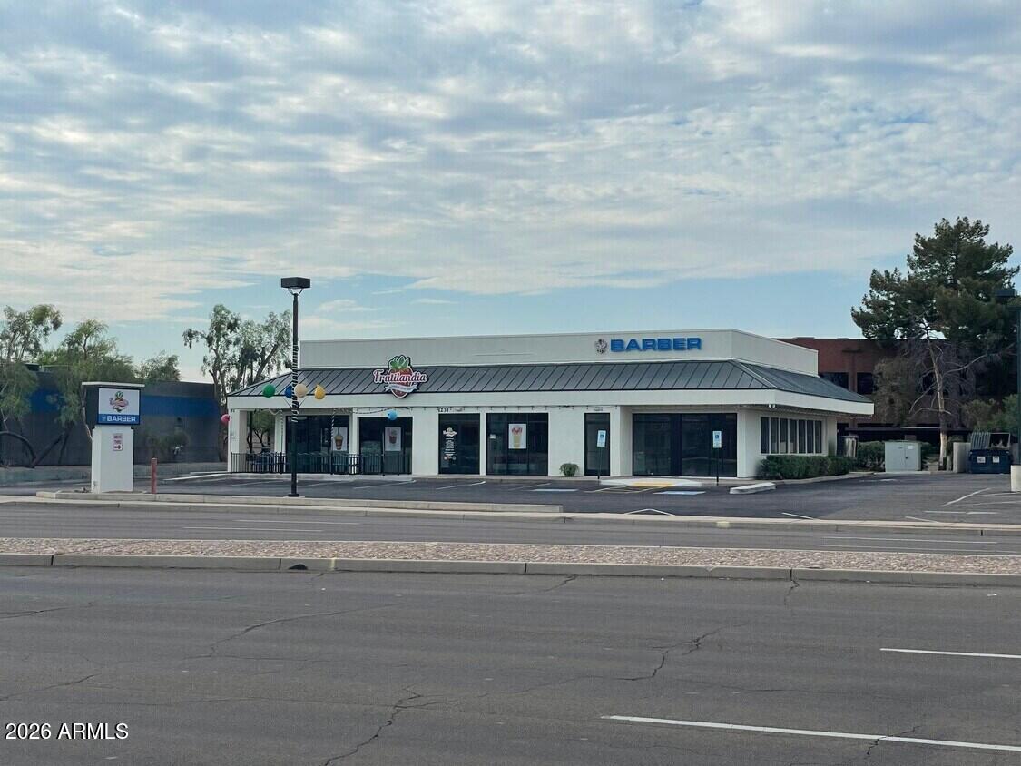 Great location for a retail business.  You can either buy the building and retain tenants, or use as owner use.  Presently a restaurant and barber shop. Stand alone building with drive through for the restaurant.  Good lighting, remodeled in 2022.