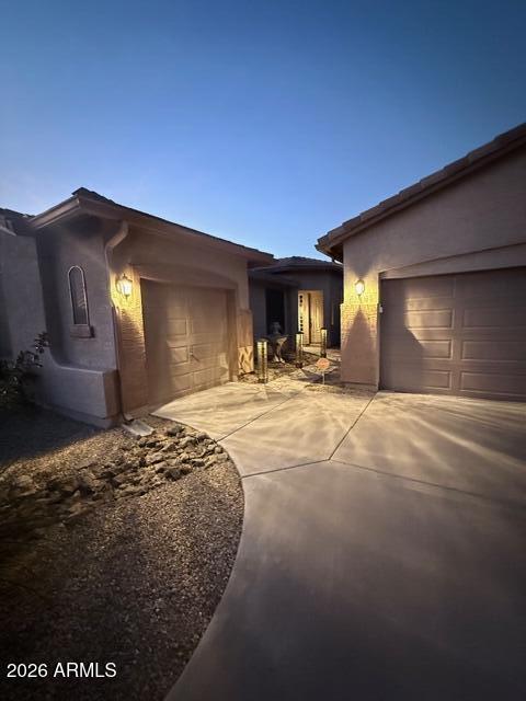 Beautifully lovingly updated Laveen home with resort-style backyard featuring pool, spa, solar-lit pergolas and outdoor kitchen with BBQ, mini-fridge and bar. Covered patio offers sunshades, fans, heaters, built-in mini bar and cantilever umbrellas. Interior includes tile floors, granite/stone counters, pendant lighting, lighted fans, Levelor blinds and custom treatments. Kitchen has butler's pantry, coffee/wine bar, pullouts, glass uppers and LG SS appliances. Primary suite features finished WI closet, Barska safes and barn door bath. Office w/French doors. Lg laundry w/glass door, sink, cabinets and LG washer/dryer. Front entry w/brass lighting and fountain. Solar electric and solar pool heating. Whole-house security and dual/single garages w/storage, insulated doors and water softener.