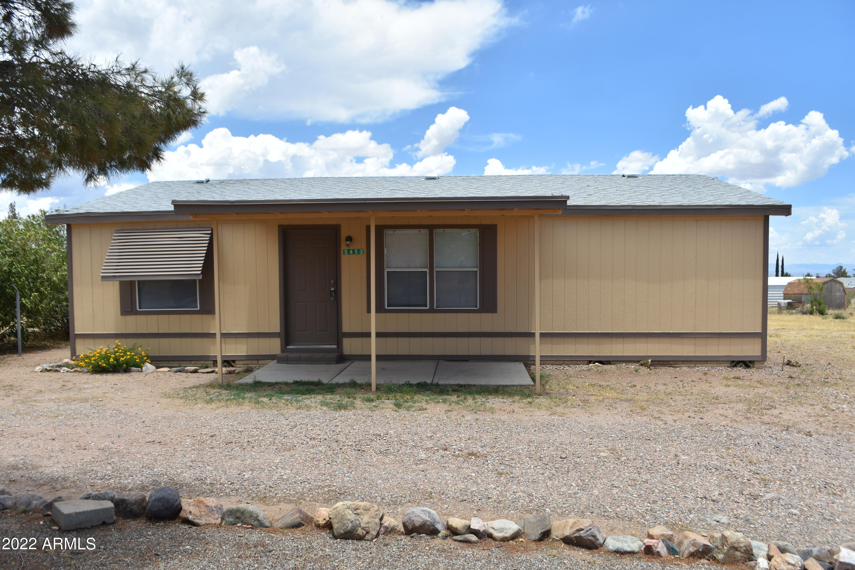 Fabulous  mountain views newly painted interior and exterior new flooring, and new furnace.  New roof April 3, 2023. Three bedrooms two bedrooms split floor plane. Almost one acre.  Wire fence around property.  The backyard is enclosed with fencing.  Move in Ready.