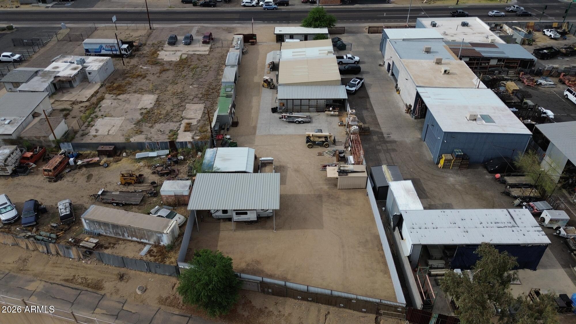 1525 W Hatcher Rd is a 4,920 SF freestanding industrial flex building on a 0.57-acre site with a secured, fenced contractor yard, a rare
combination in the Sunnyslope infill submarket. The improvements include 680 SF of office and 4,240 SF of warehouse with 10-13' clear
height and two grade-level roll-up doors (10' x 16' main and 7' x 12' secondary). The site fronts directly on W Hatcher Rd, providing
visibility and signage on a high-traffic east-west arterial. Split C-3/C-2 zoning supports contractor, fleet/service, light distribution, autorelated, and small-manufacturer operations. Offered for sale vacant and delivered at close (seller would prefer 1-2 month leaseback for
move out). Well-suited to an owner-user with SBA 504 / 7(a) financing or the available seller financing.